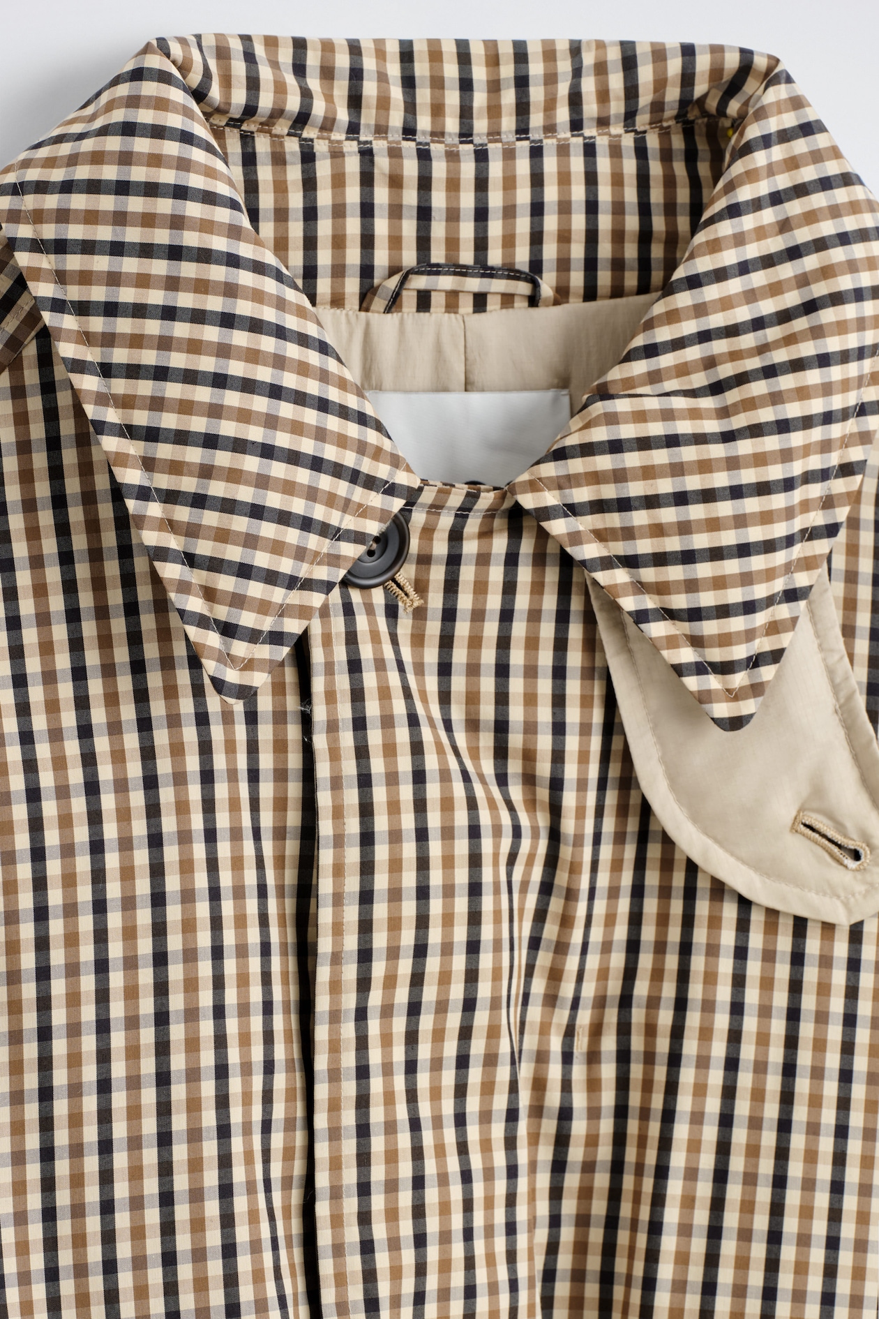 PADDED BELTED FUNNEL-NECK LONG COAT — BEIGE / CHECKED