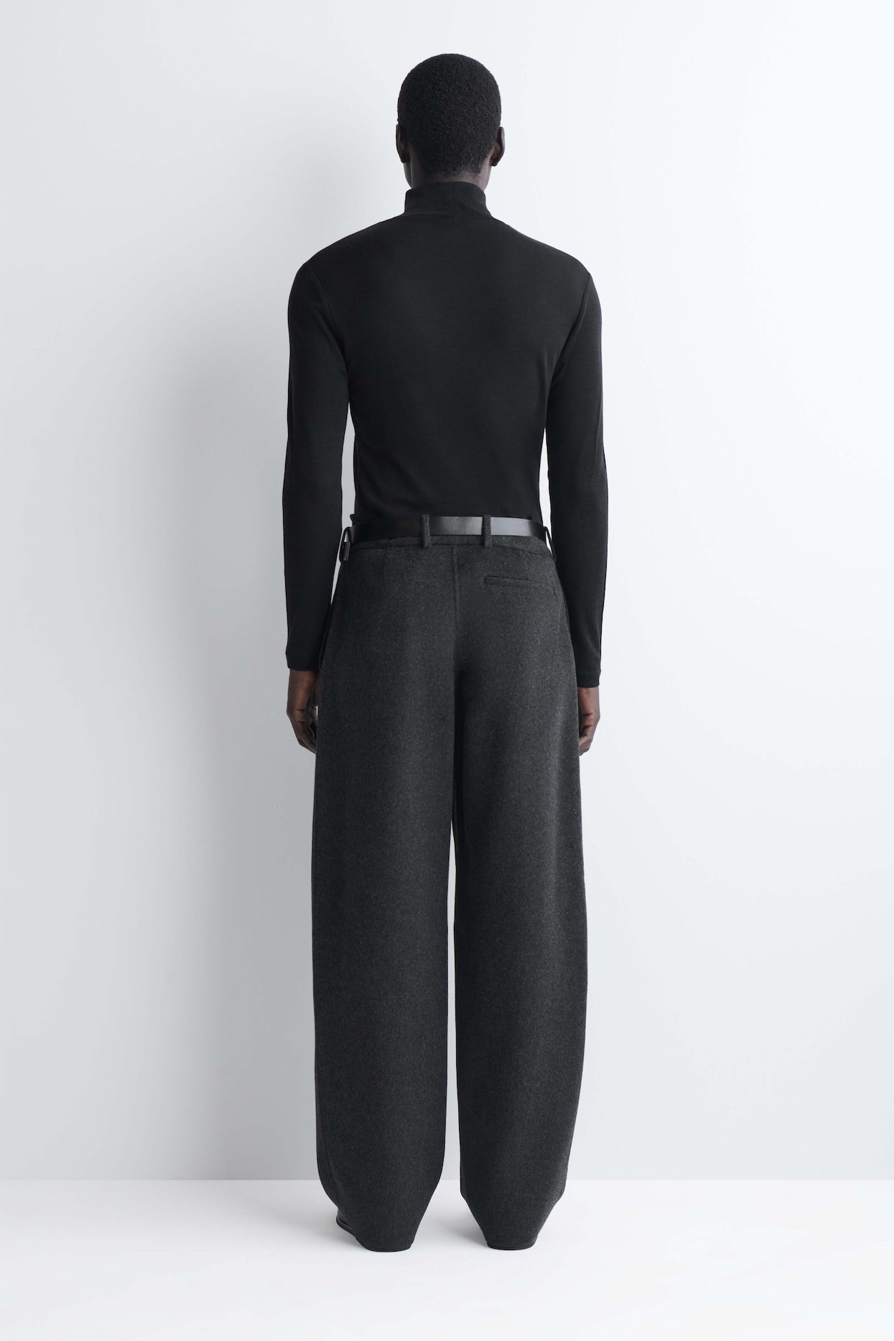 SLIM WOOL-JERSEY ROLLNECK TOP — BLACK