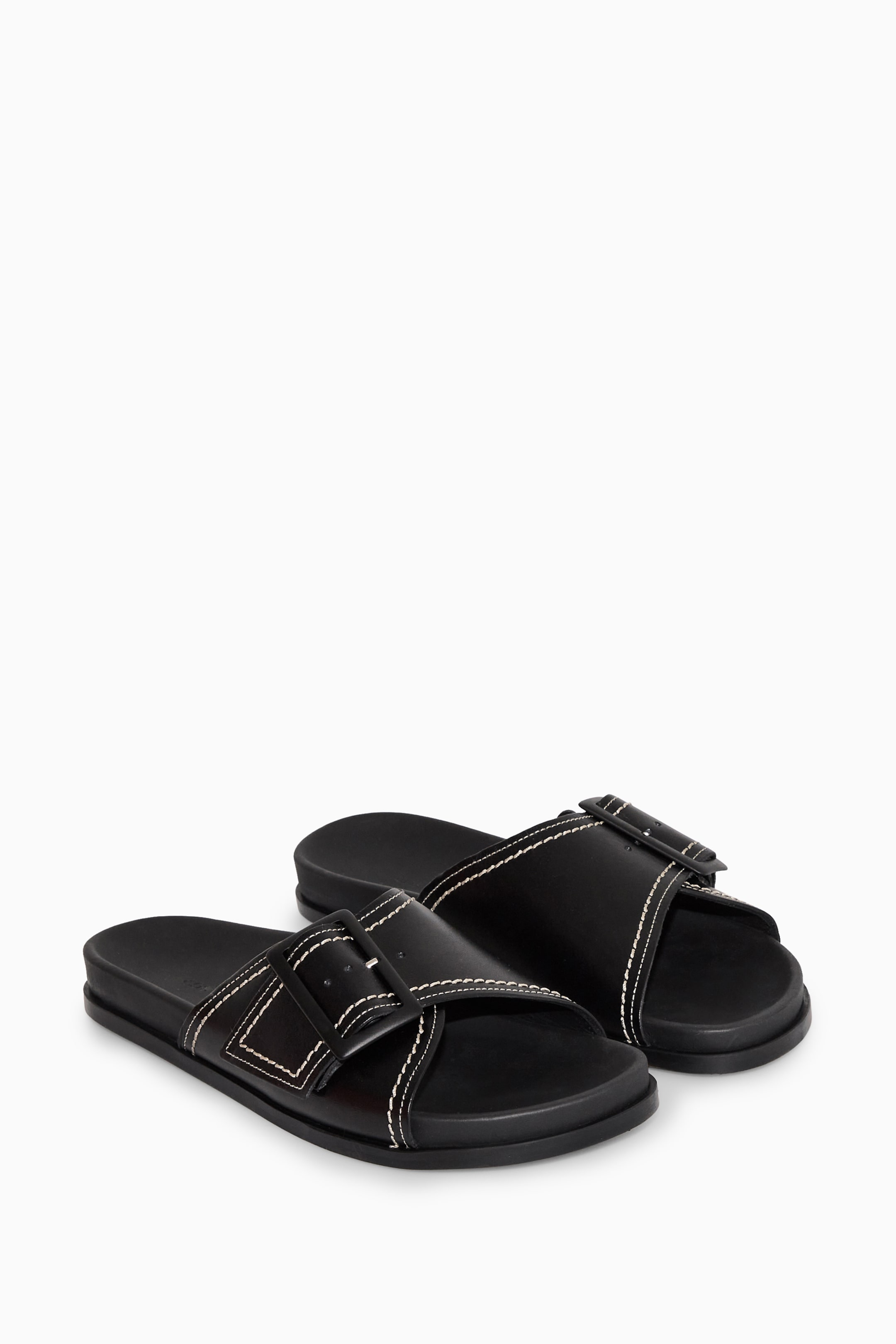 Grösseres Bild ansehen: LEDER-PANTOLETTEN MIT SCHNALLE UND KONTRASTNÄHTEN - SCHWARZ/WEISS - DAMEN | H&M CH 4