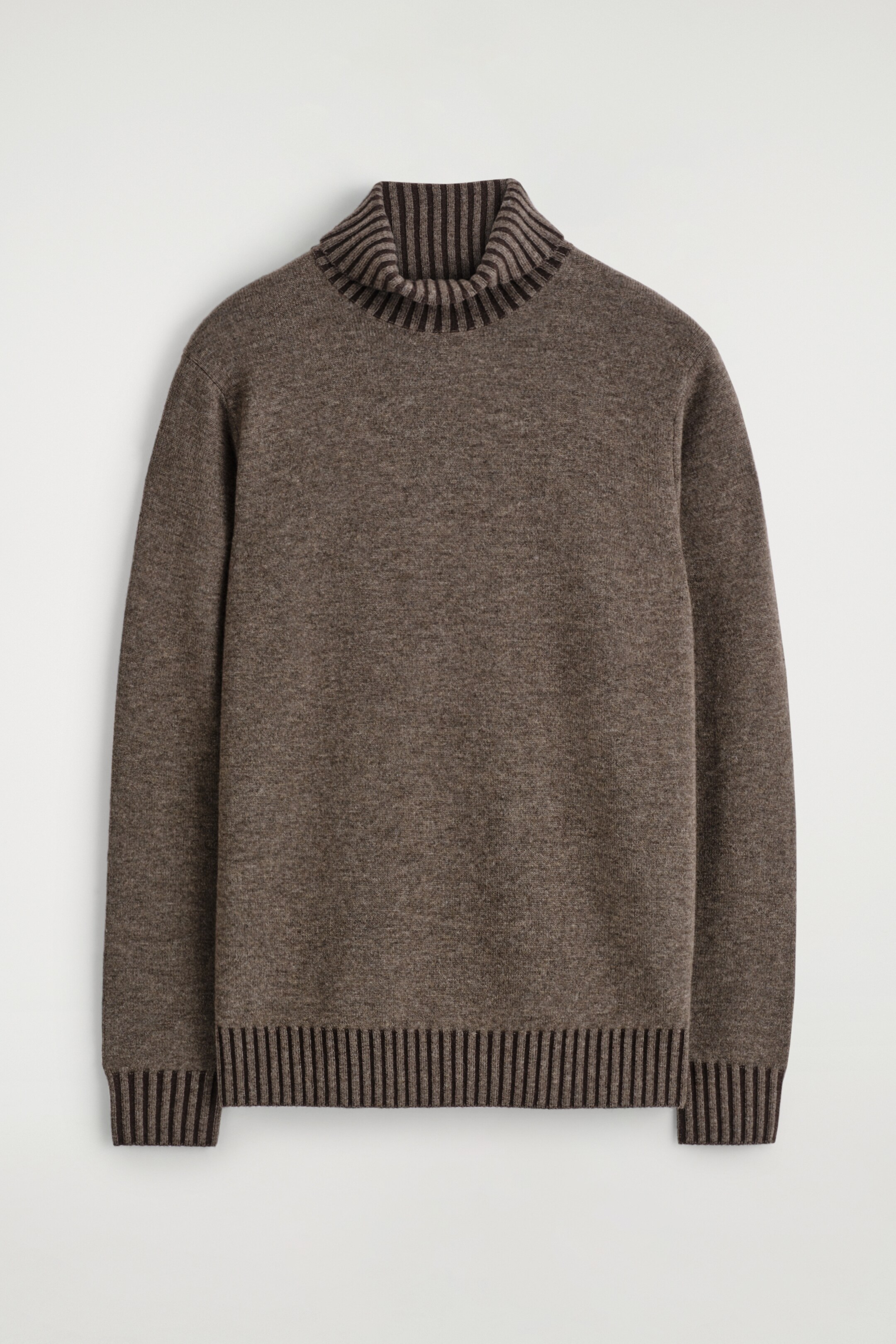 View larger image: A brown heathered knit turtleneck sweater is being presented from the front. It is featuring a ribbed turtleneck collar, ribbed cuffs, and a ribbed hem, all displaying darker brown vertical stripes within the ribbing.