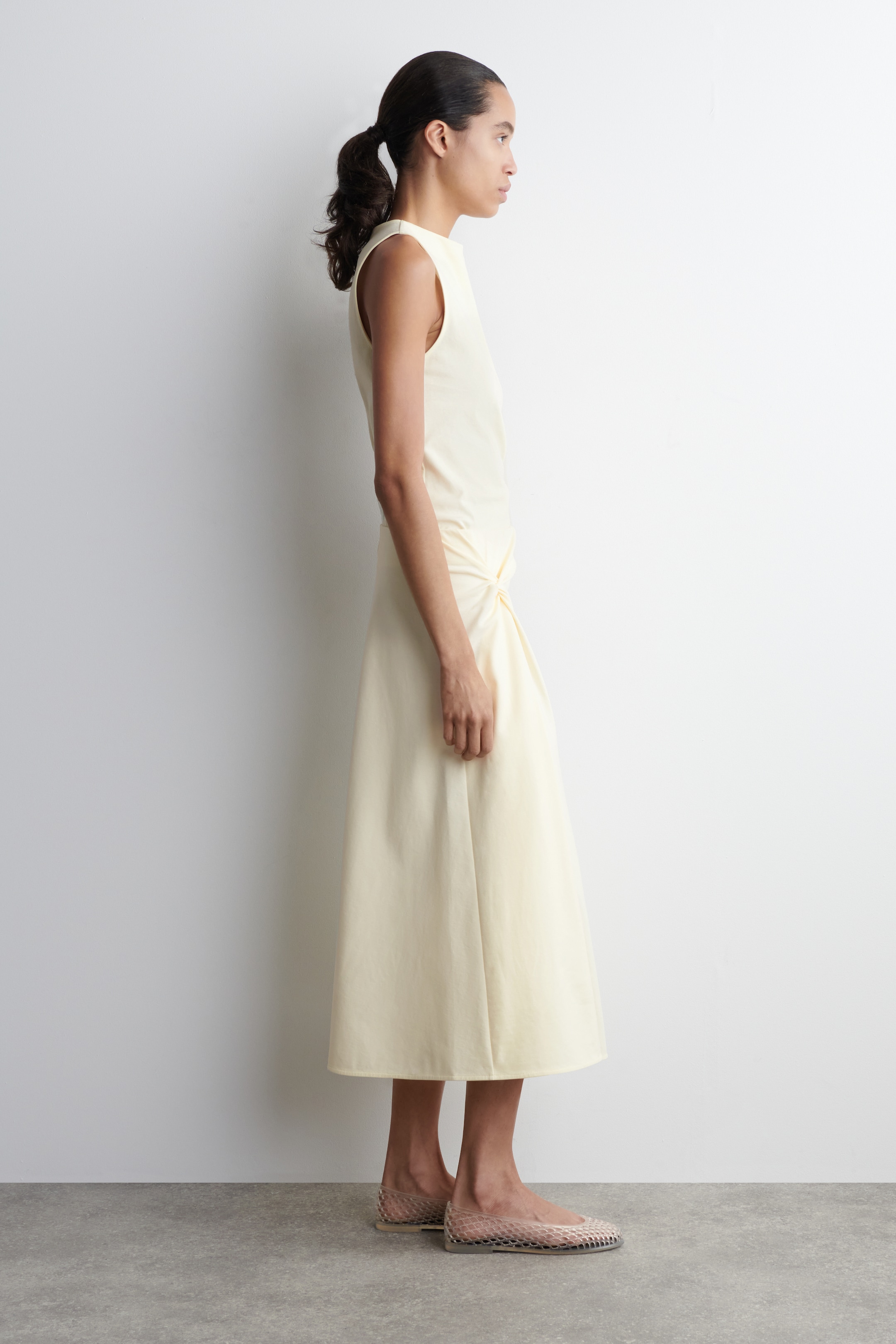 Ingrandisci l'immagine: TWIST-DETAIL MIDI SKIRT - BUTTER YELLOW - DONNA | H&M CH 3