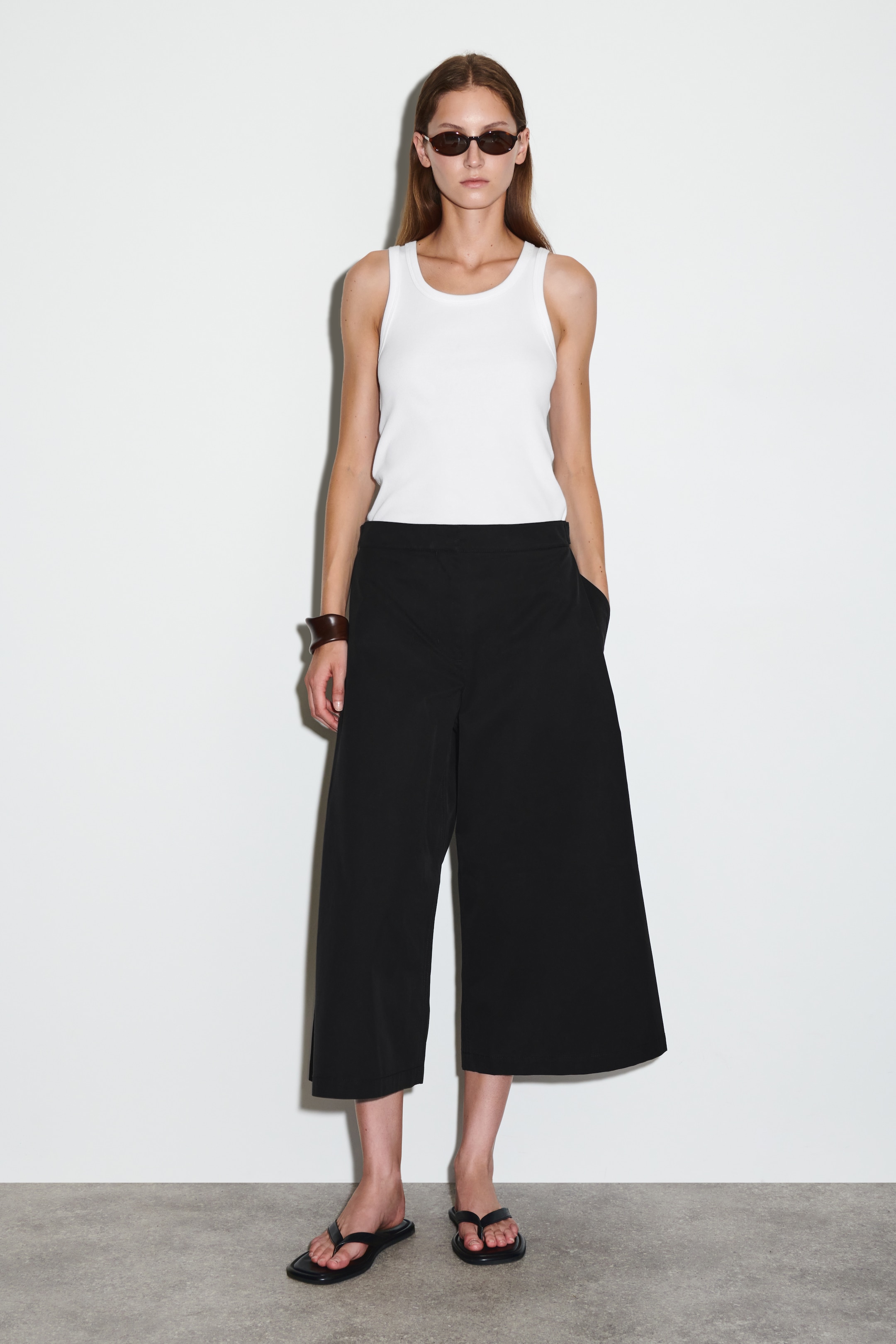 Visualizza immagine più grande: PANTALONI A GAMBA LARGA CROPPED IN COTONE - NERO - DONNA | H&M IT 1