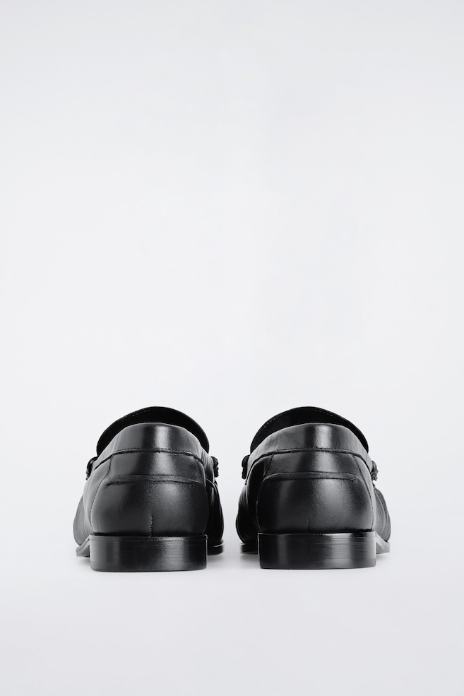 RUCHED LEATHER LOAFERS — BLACK