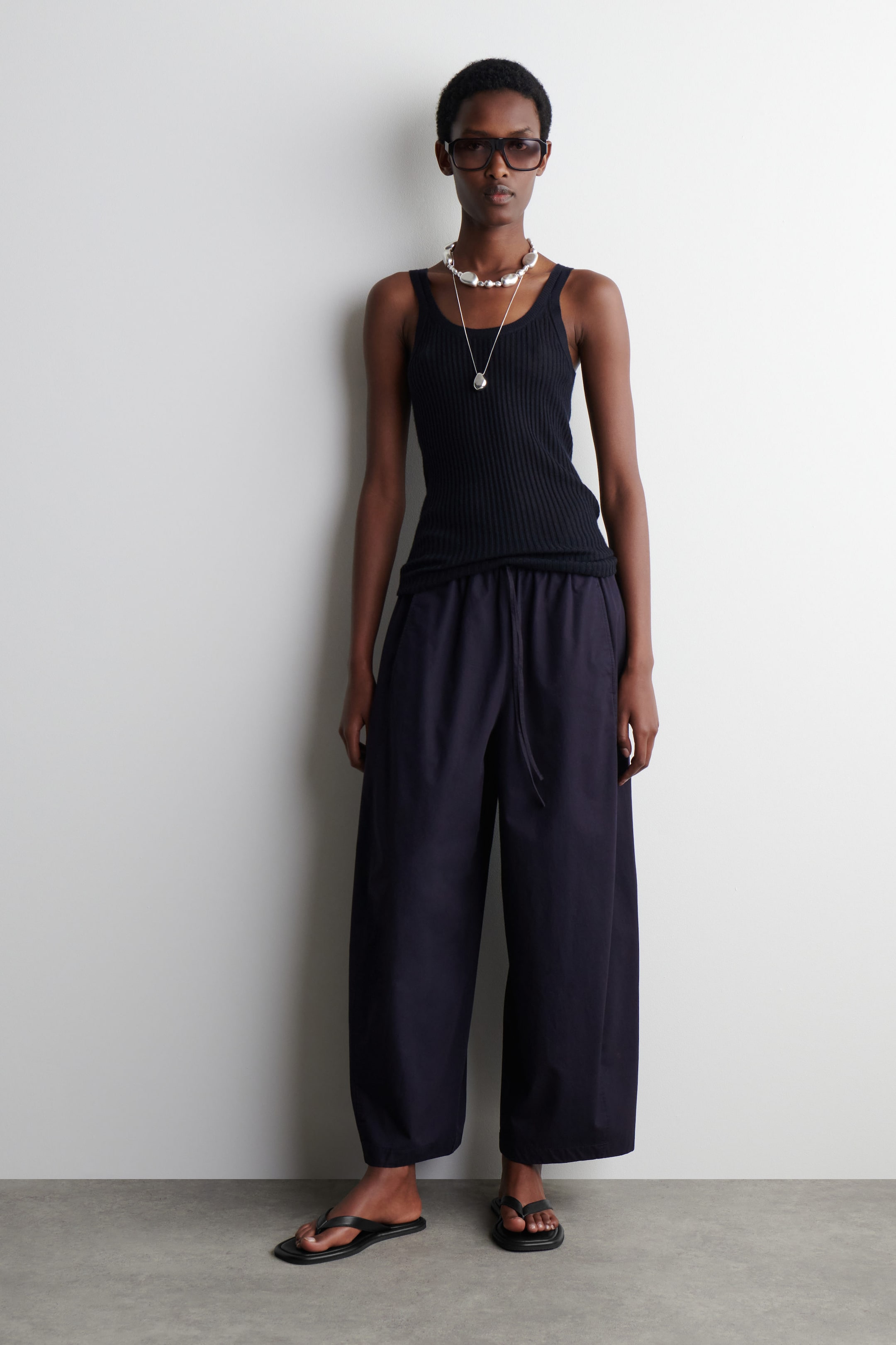 ELASTICATED BARREL-LEG TROUSERS