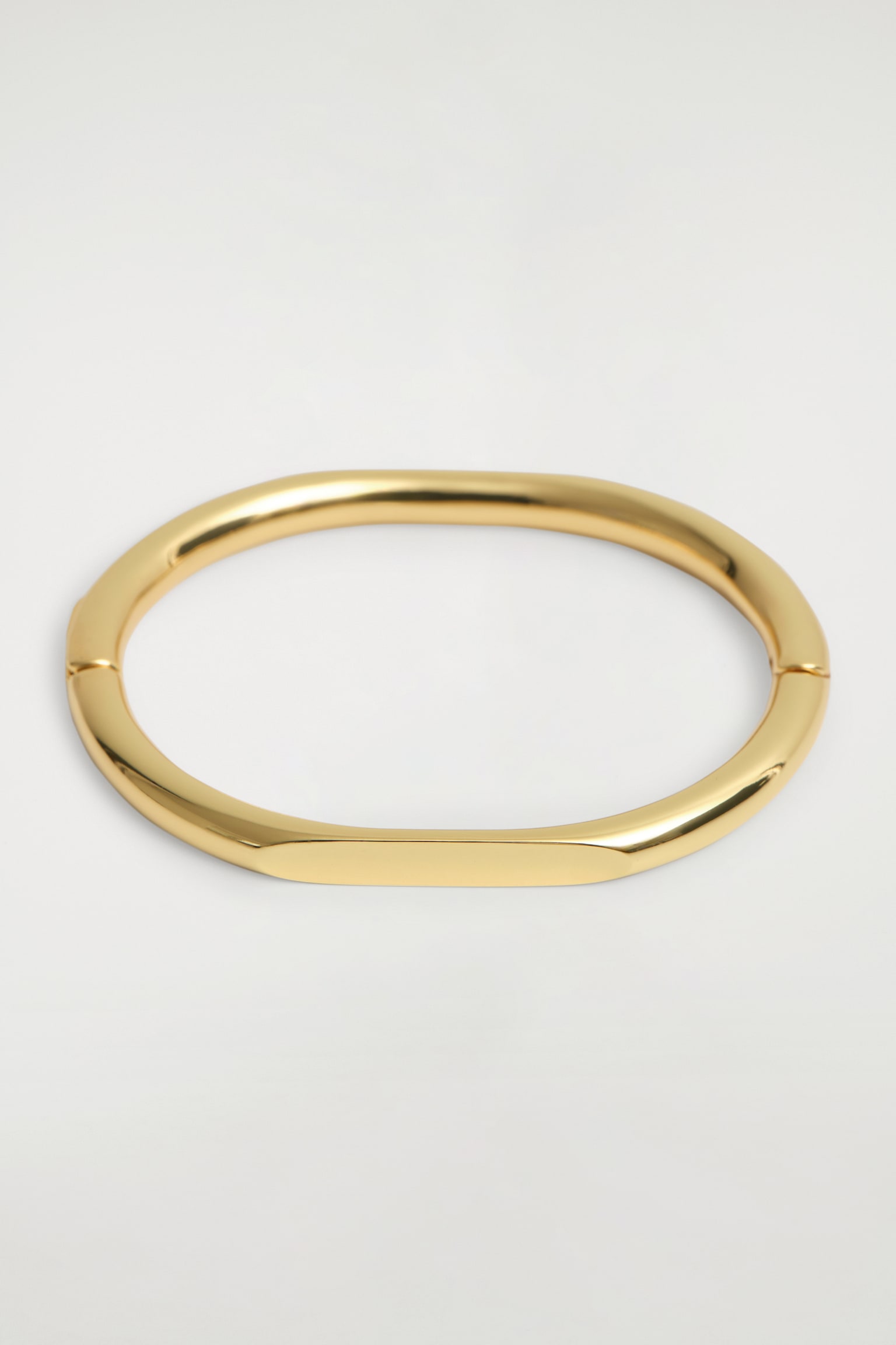BRACCIALE RIGIDO DALLE LINEE SCOLPITE - ORO/ARGENTO - 2