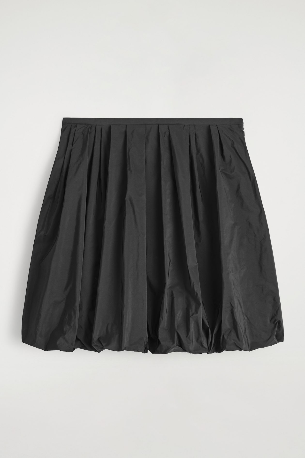 BUBBLE-HEM MINI SKIRT — BLACK