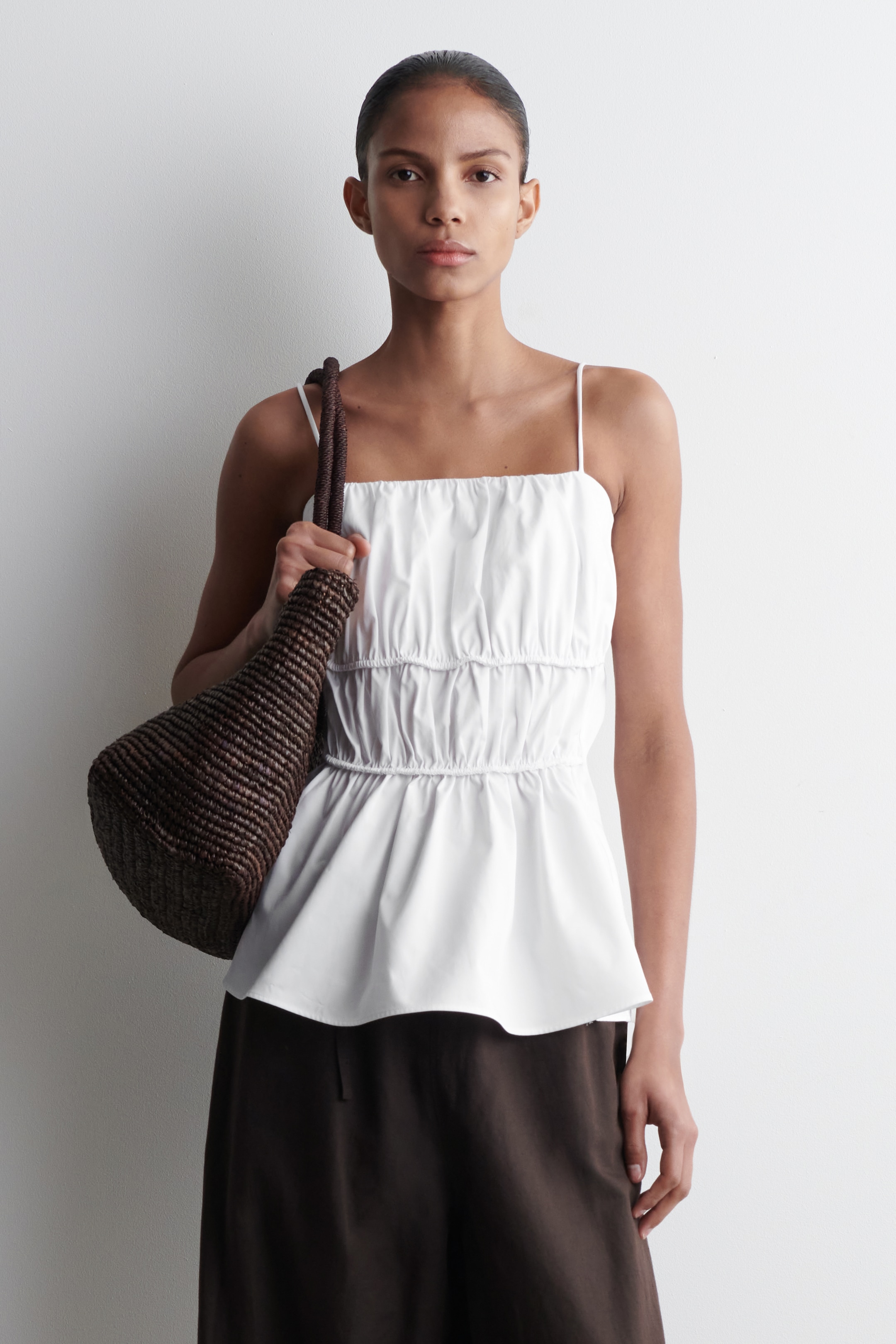 Grösseres Bild ansehen: OBERTEIL AUS BAUMWOLLE MIT SCHÖSSCHEN - WEISS - DAMEN | H&M CH 1