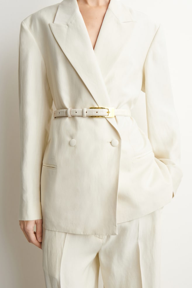 ELONGATED-BUCKLE LEATHER BELT — IVORY / CROC EFFECT