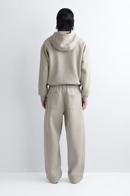 COTTON-PIQUÉ OVERSIZED BARREL-LEG JOGGERS — BEIGE 3