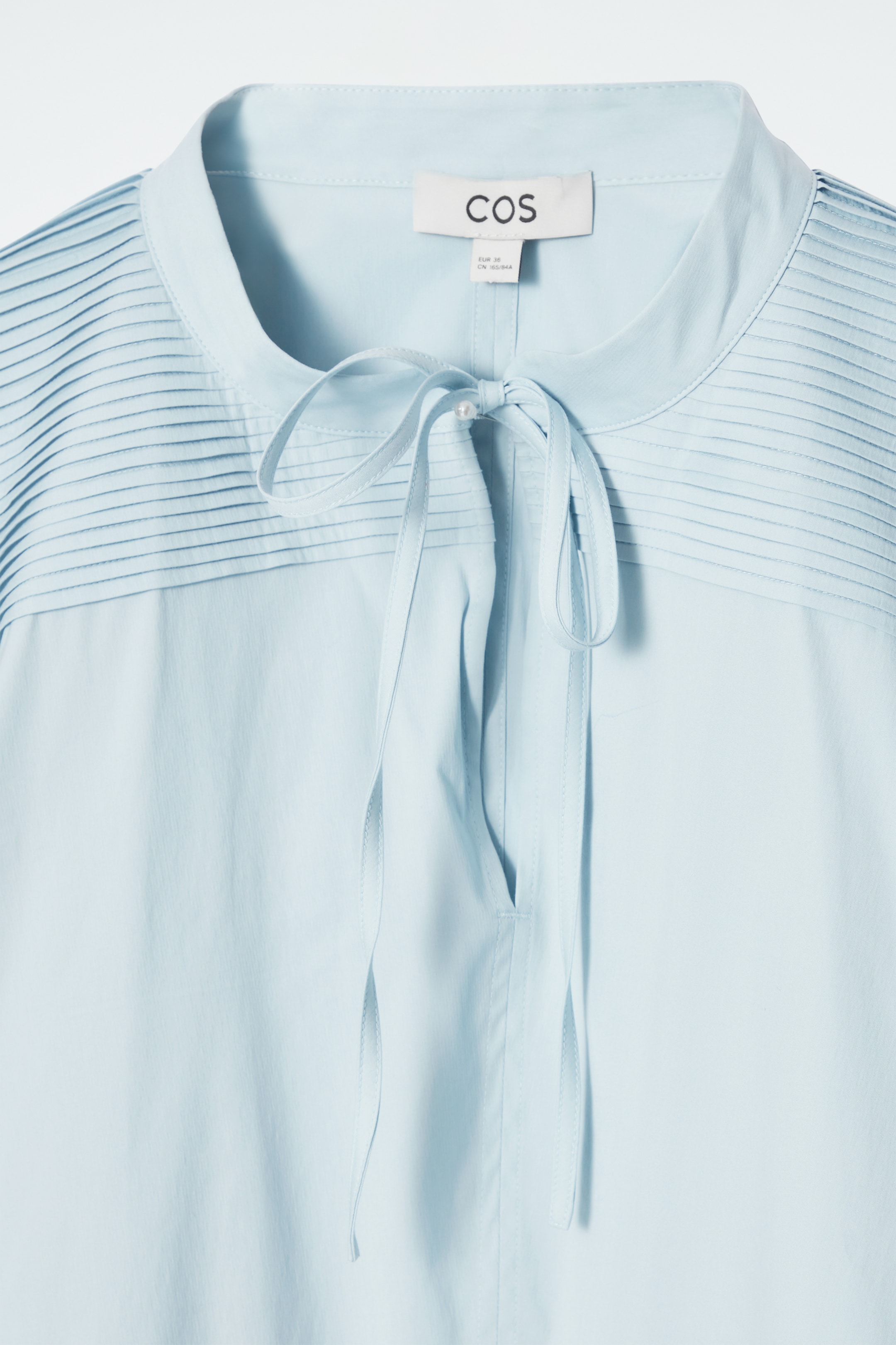 View larger image: TIE-DETAIL PLEATED BLOUSE - POWDER BLUE - Ladies | H&M GB 2
