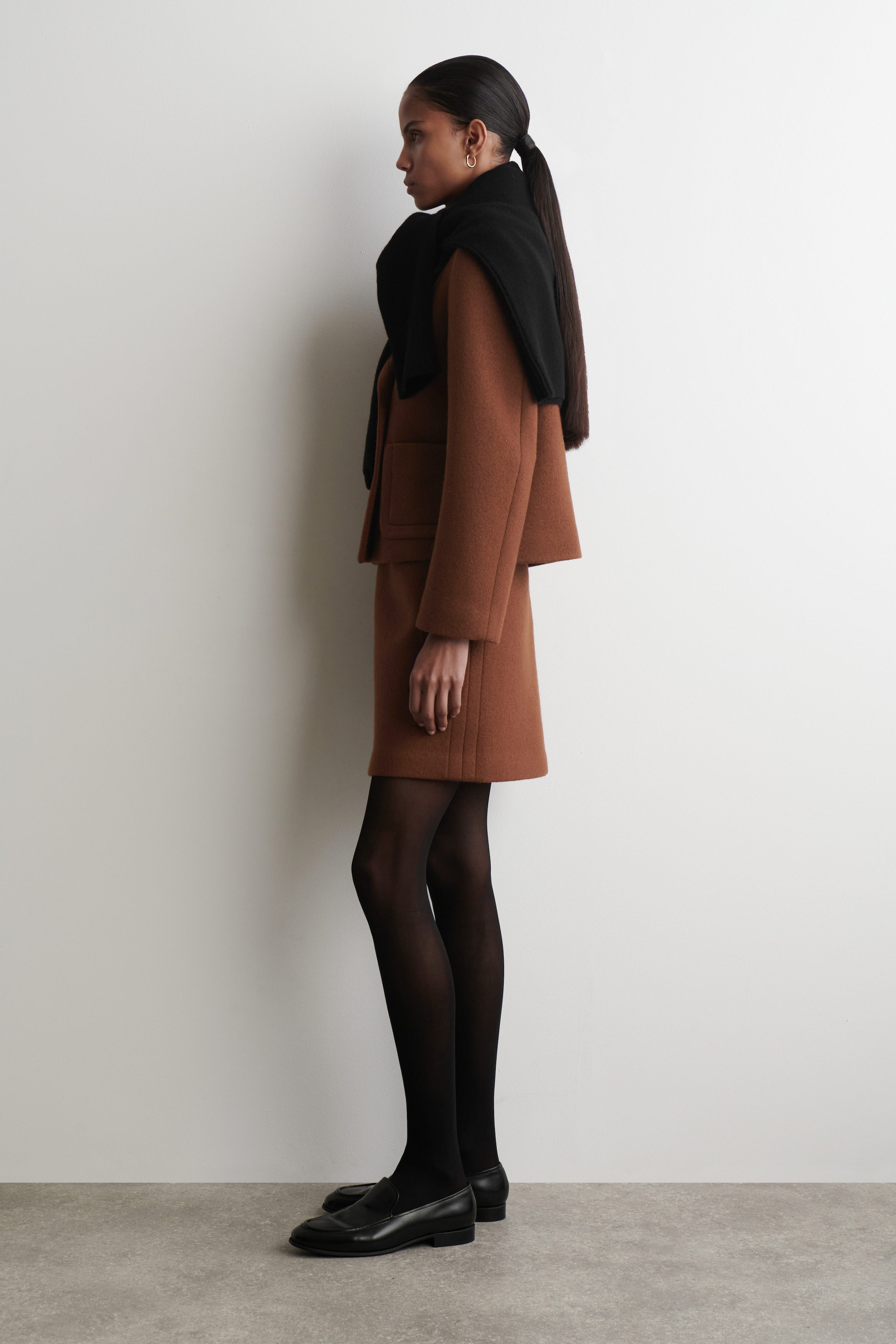 MINI-JUPE EN LAINE SURPIQUÉE