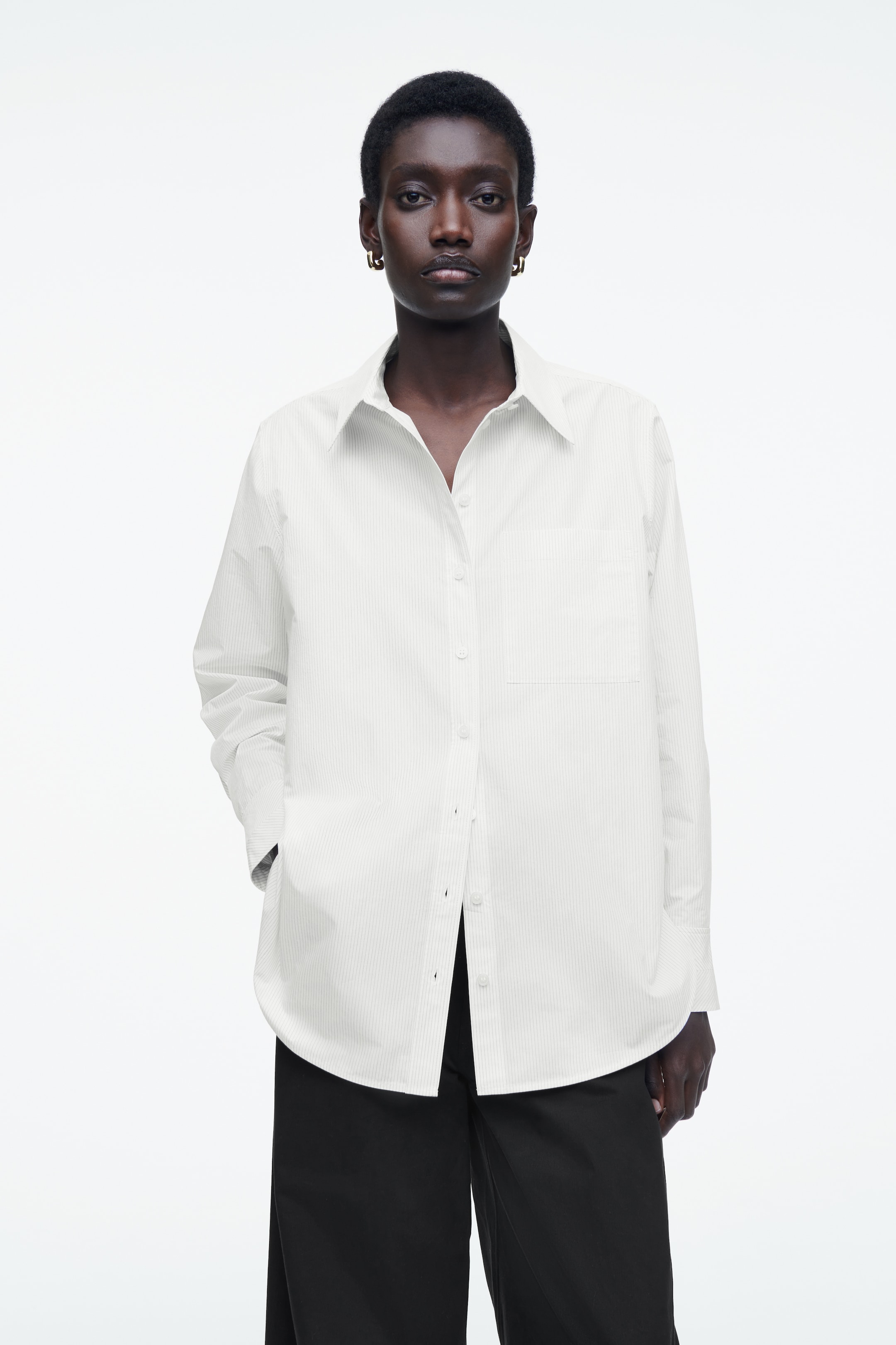 Visualizza immagine più grande: CAMICIA SARTORIALE IN COTONE PIMA - AVORIO / GESSATO - DONNA | H&M IT 1