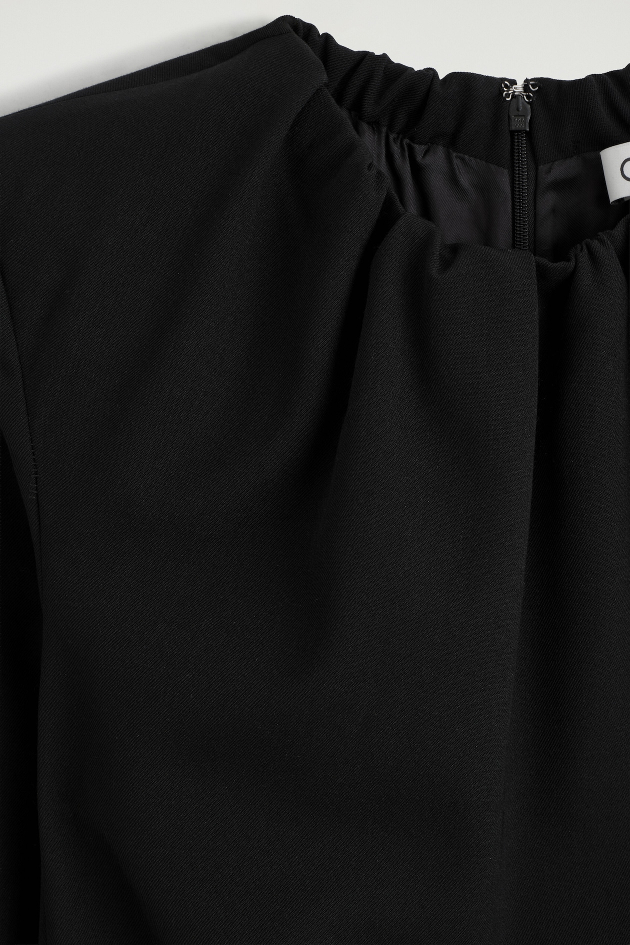 PLEATED TAILORED TWILL MINI DRESS — BLACK