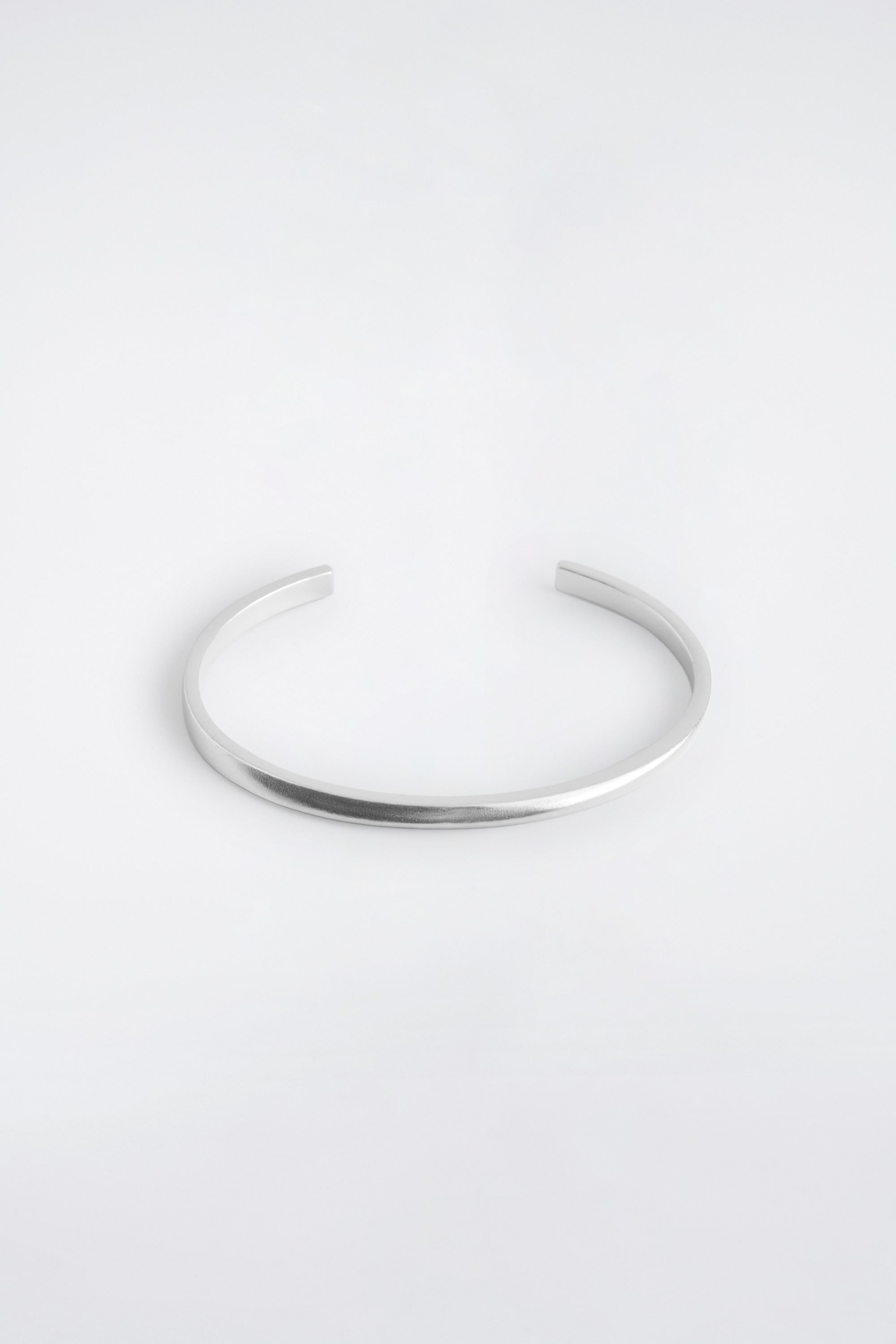 BRAZALETE DE PLATA DE LEY RETORCIDO - PLATEADO