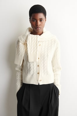 CABLE-KNIT MERINO WOOL CARDIGAN — IVORY 1