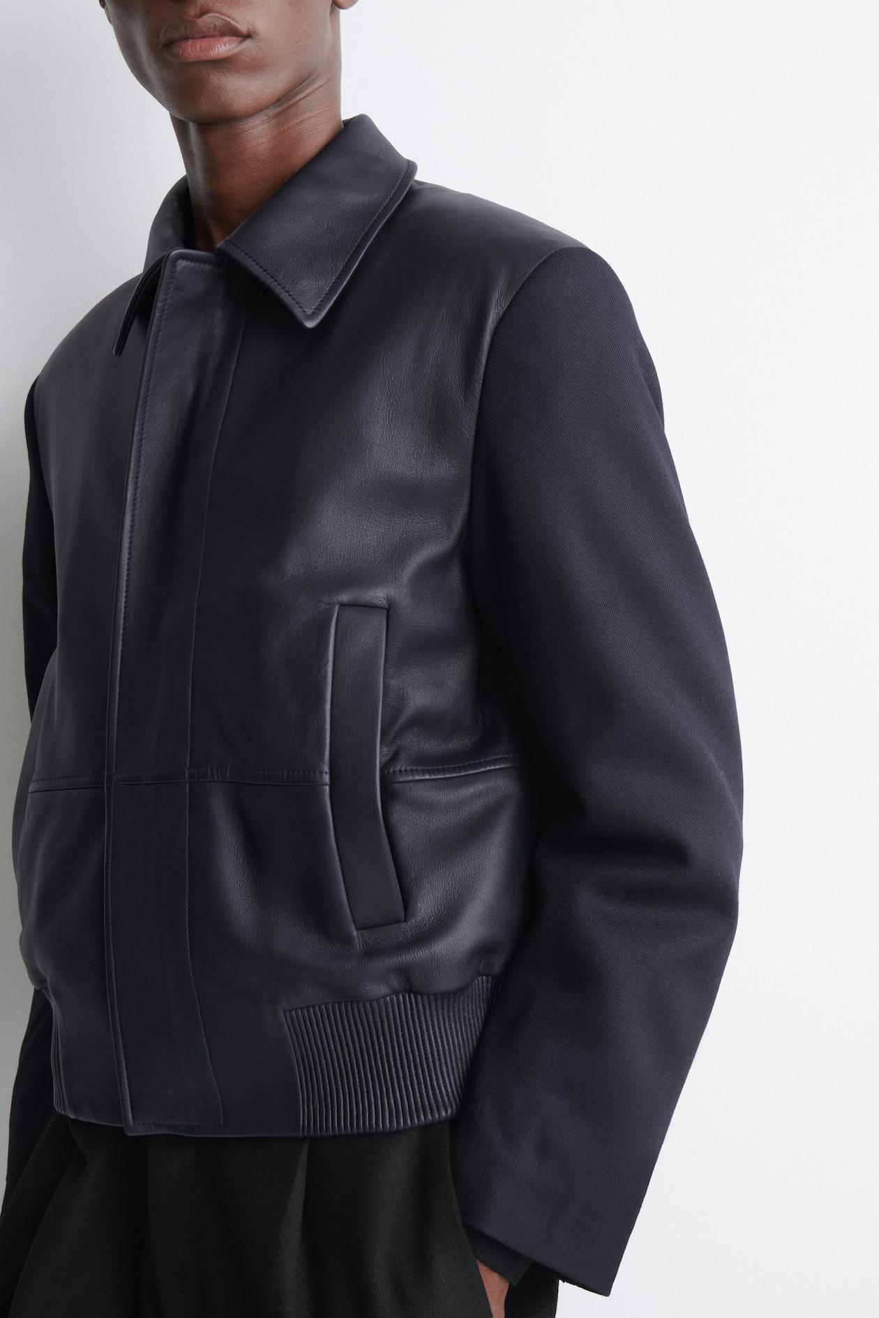 LEATHER-PANELED WOOL BOMBER JACKET — MIDNIGHT