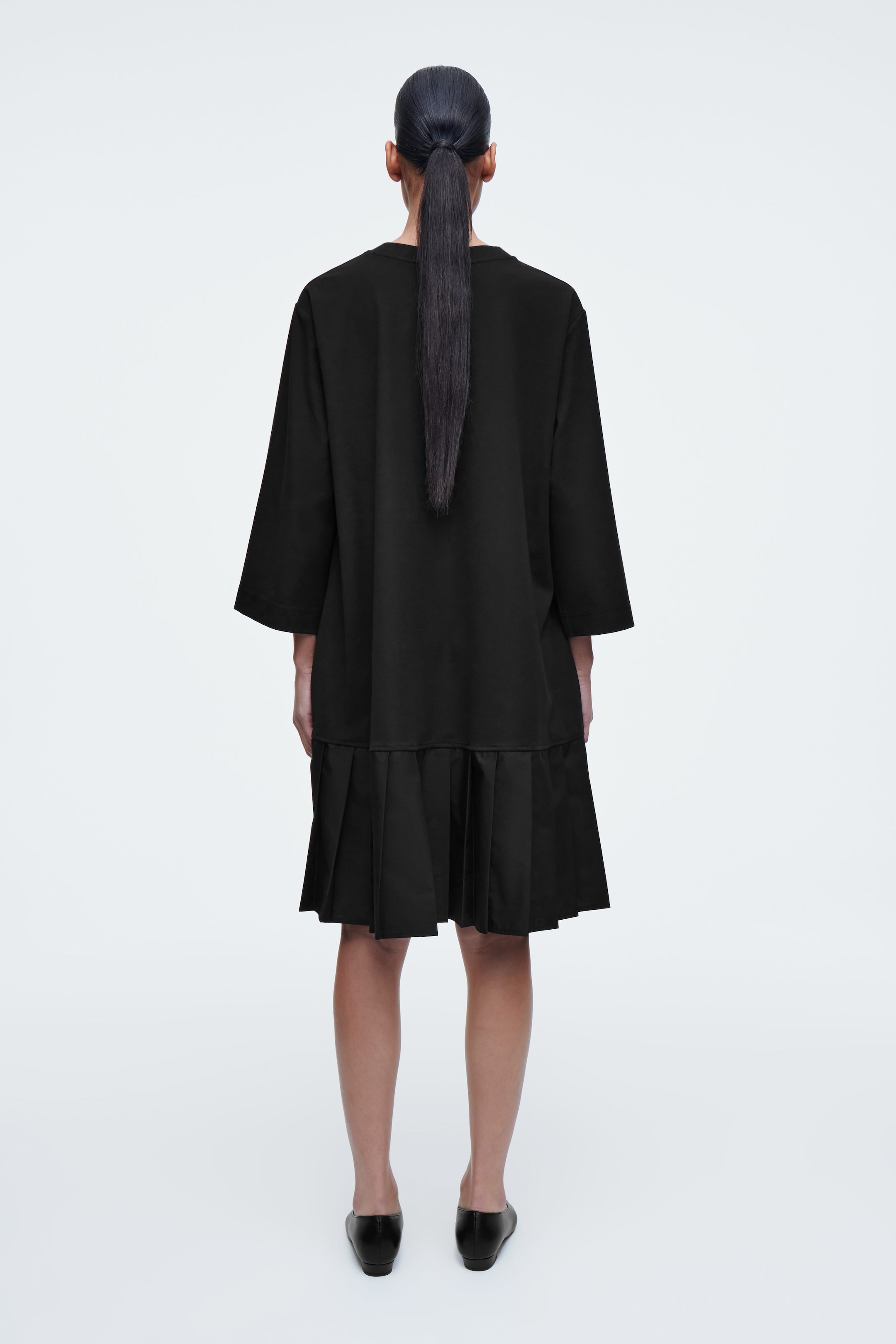 PLEATED DROPPED-WAIST T-SHIRT DRESS