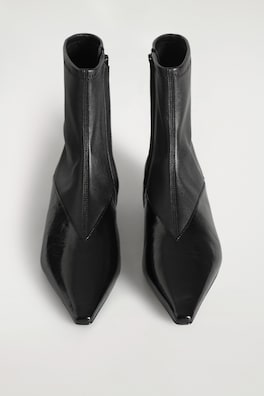 PANELED POINTED LEATHER WEDGE ANKLE BOOTS — BLACK 1