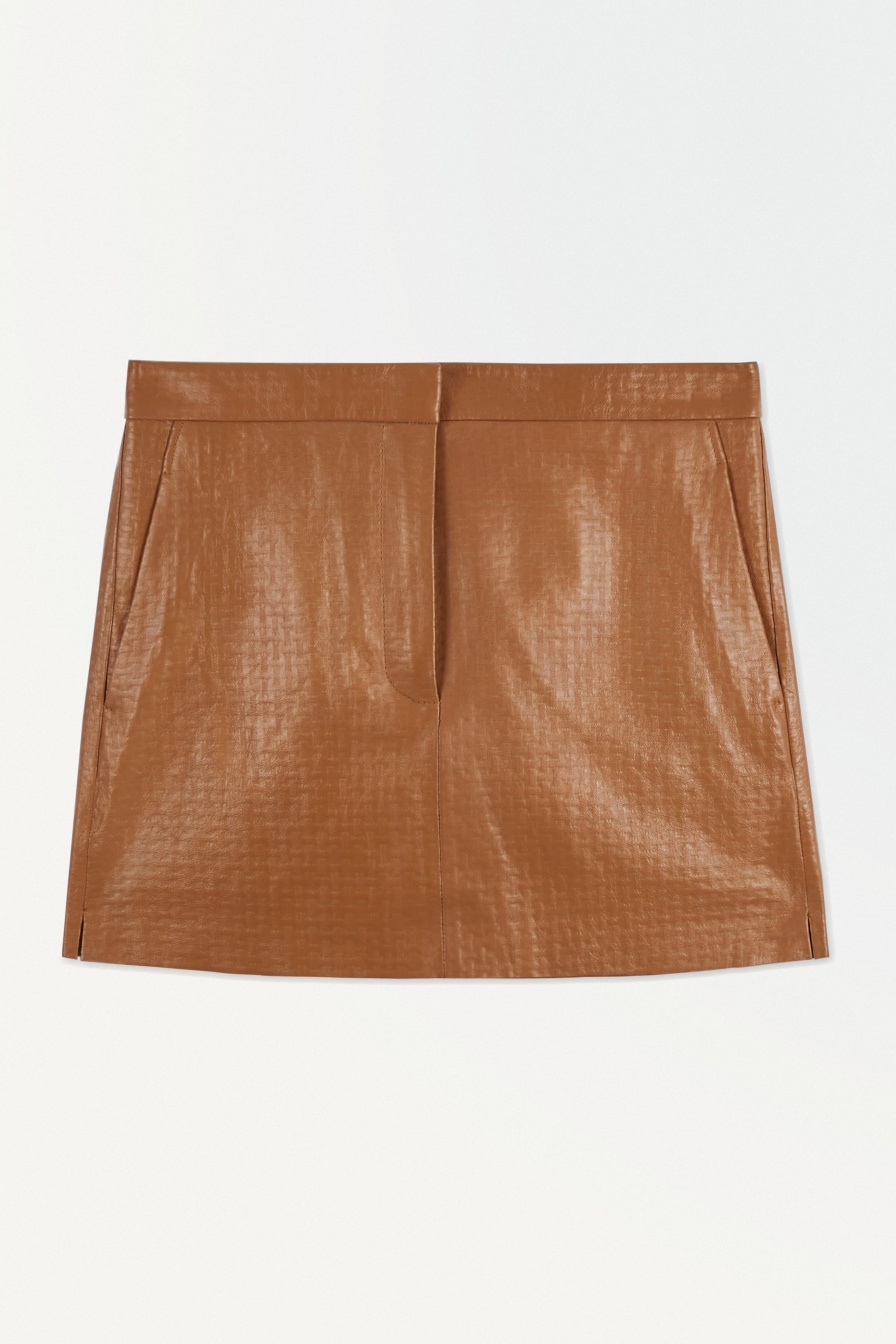 THE EMBOSSED-LEATHER MINI SKIRT
