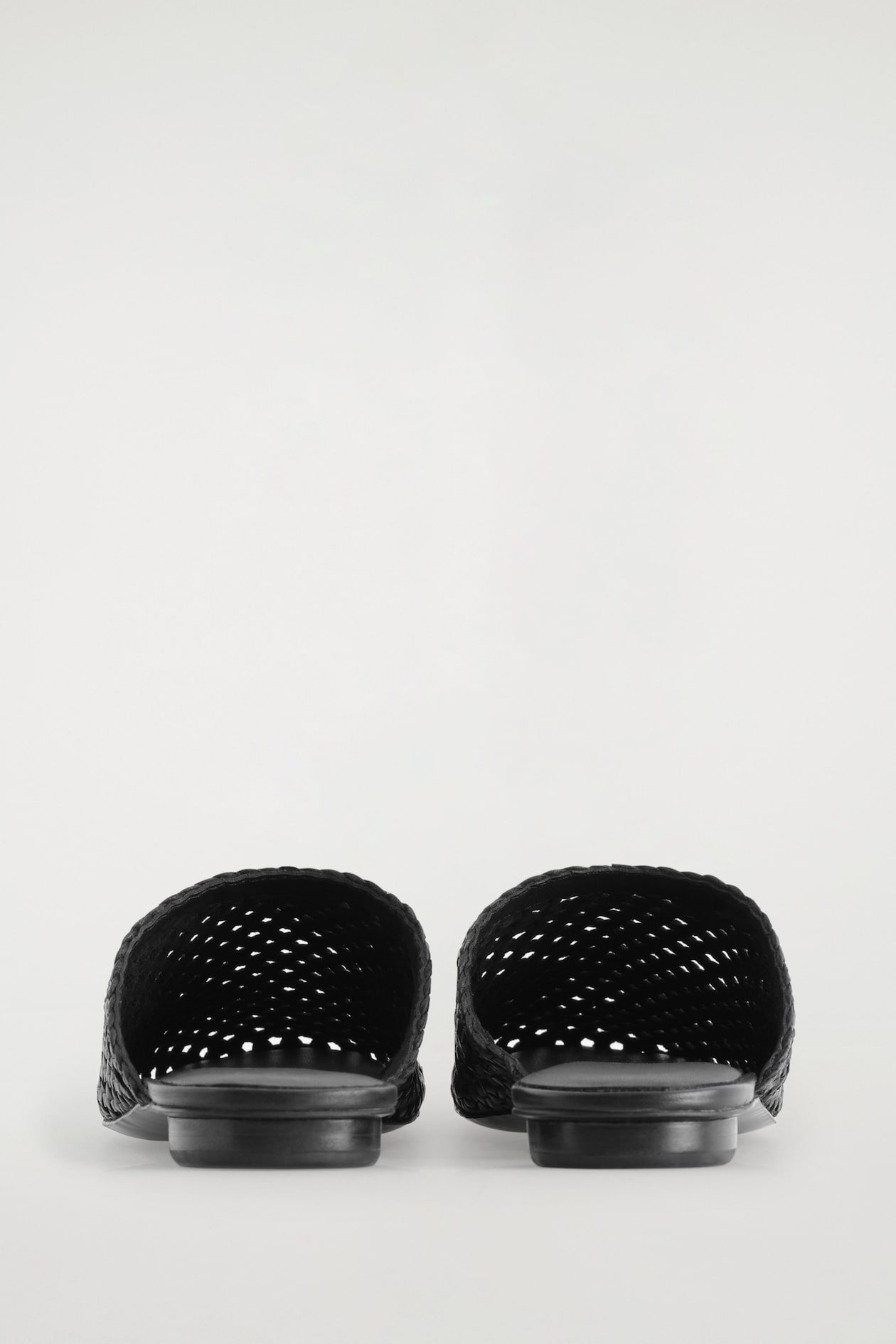 BRAIDED LEATHER MULES — BLACK