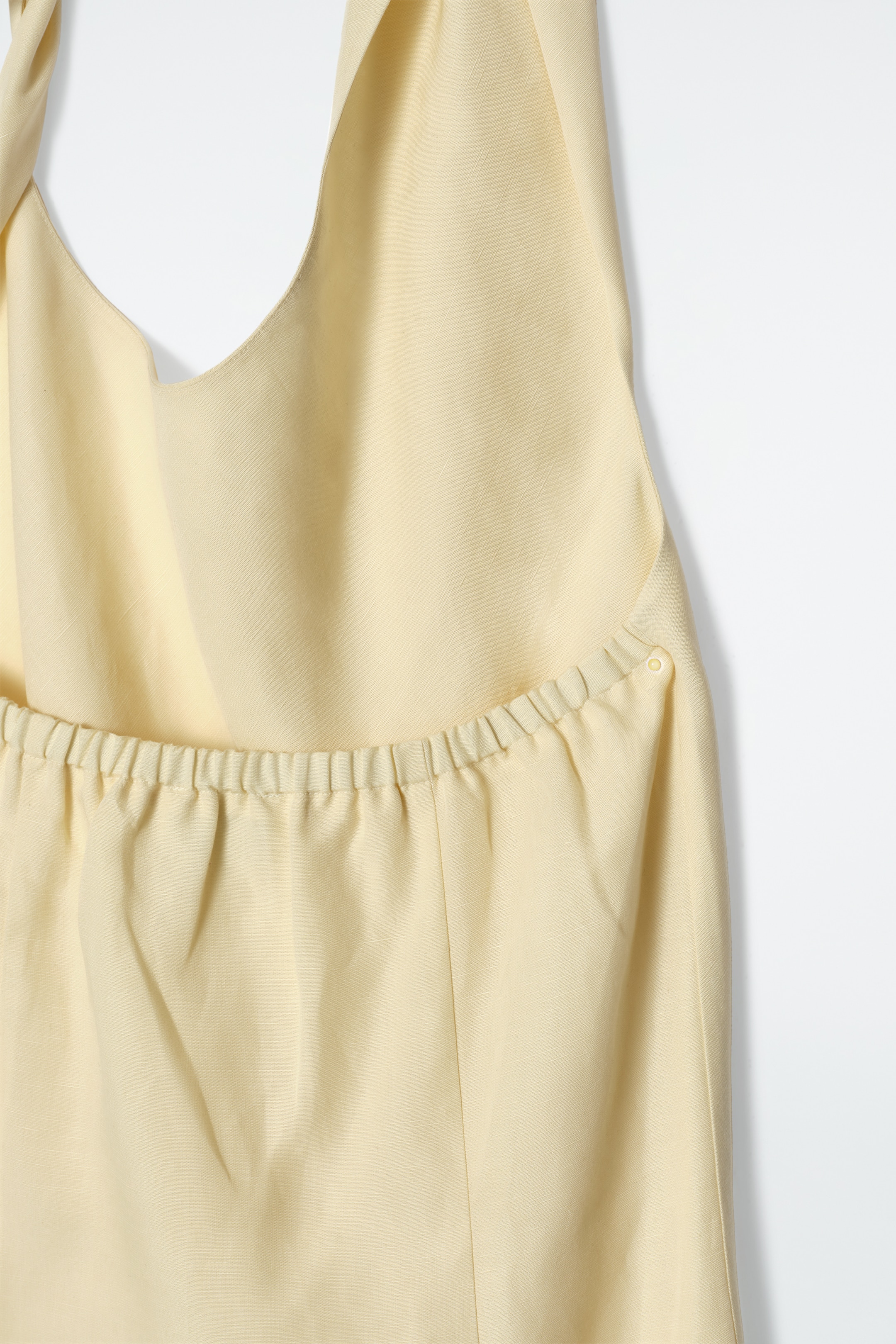 Se større billede: KJOLE I HØRBLEND MED SNOET HALTERNECK - SMØRGUL - DAME | H&M DK 7