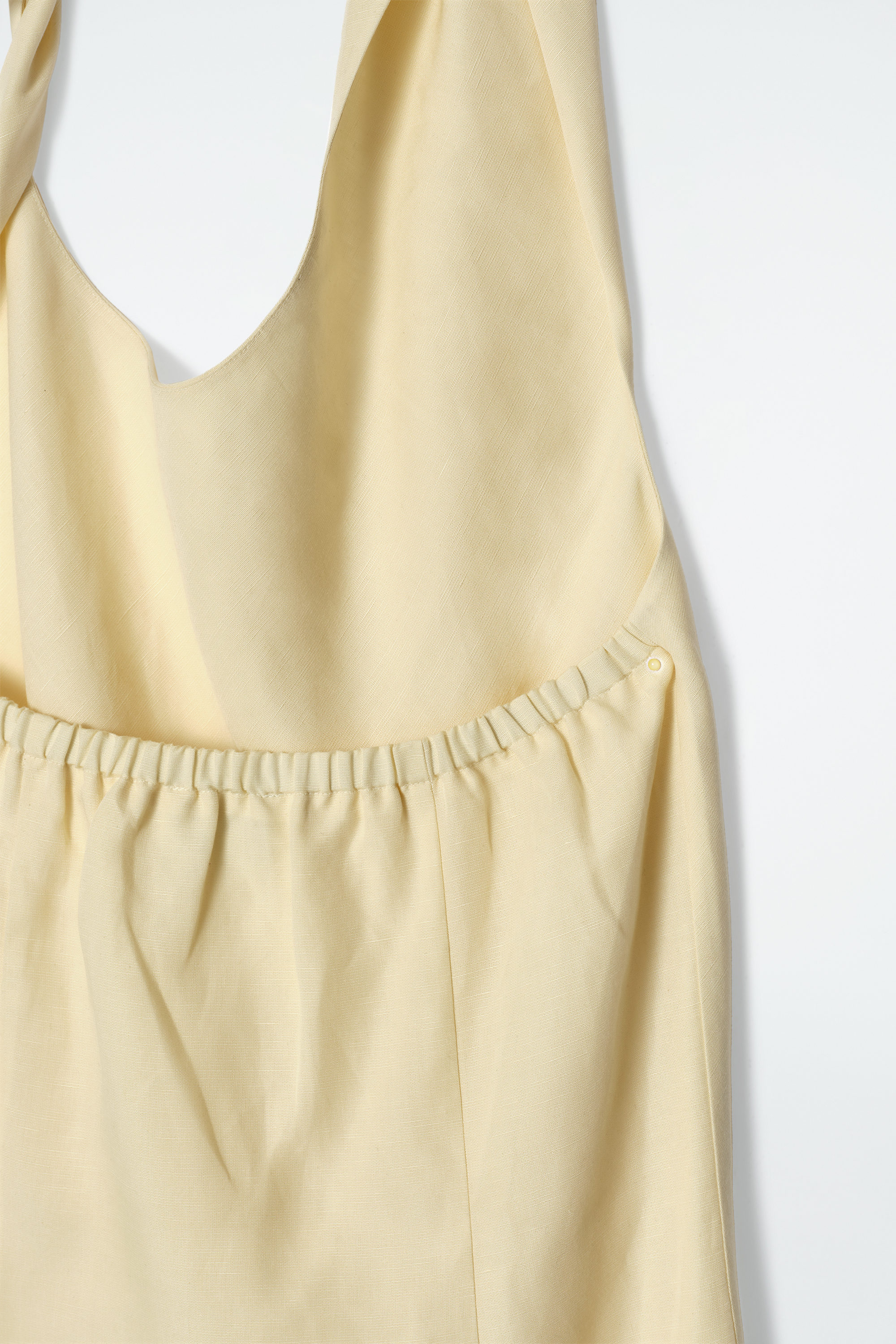 TWISTED LINEN-BLEND HALTERNECK DRESS - BUTTER YELLOW | COS US