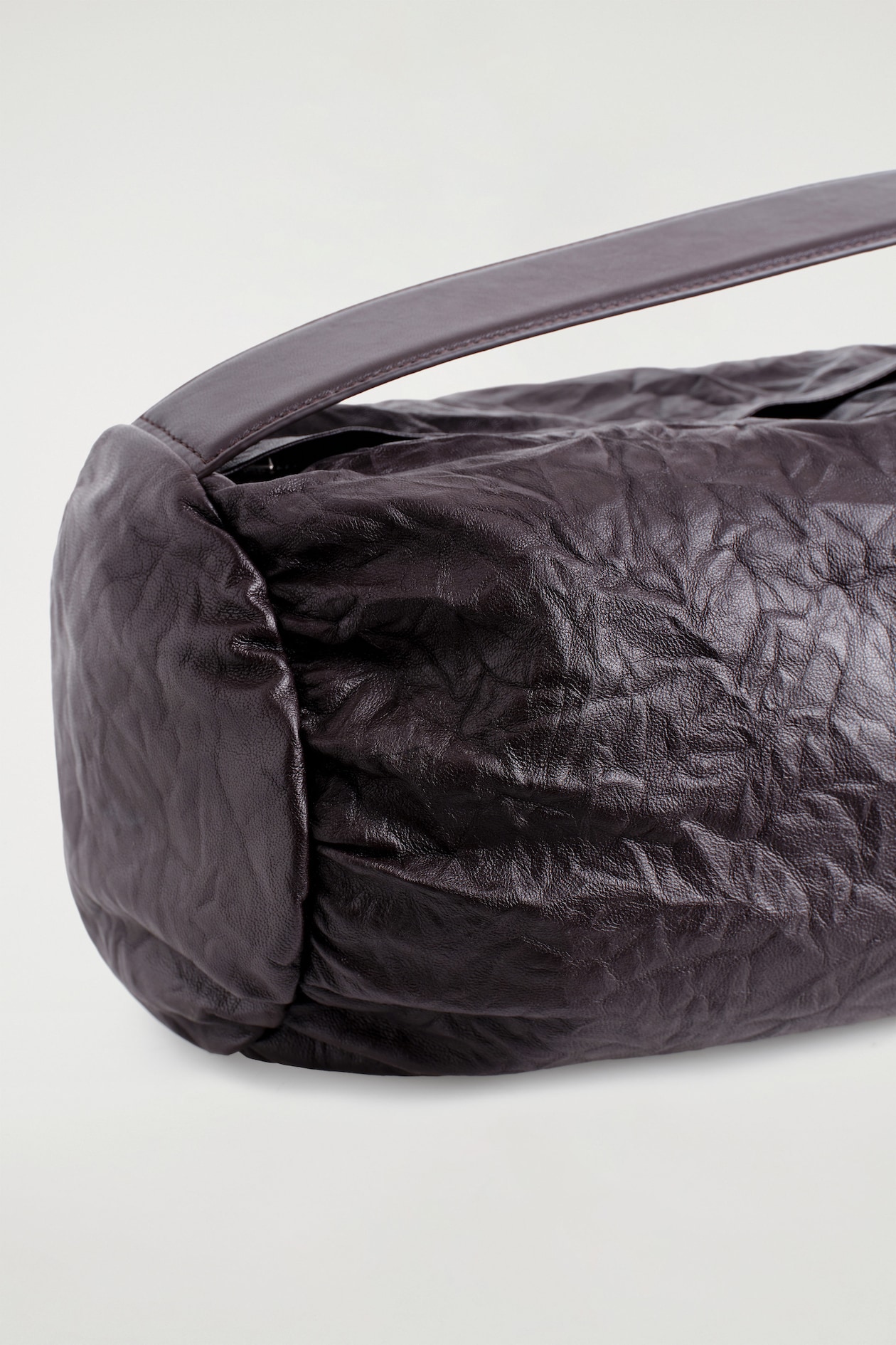 CYLINDER CLUTCH BAG - TEXTURED-LEATHER — BITTER CHOCOLATE