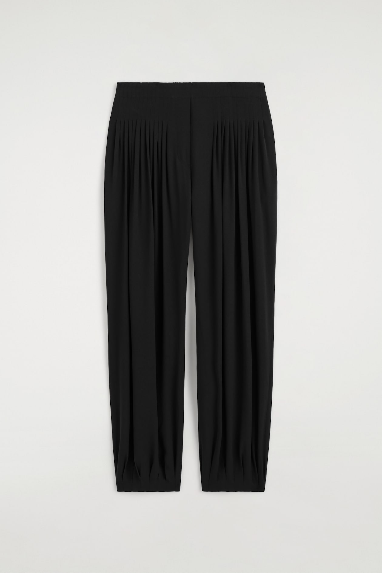 PLEATED CREPE BALLOON PANTS — BLACK