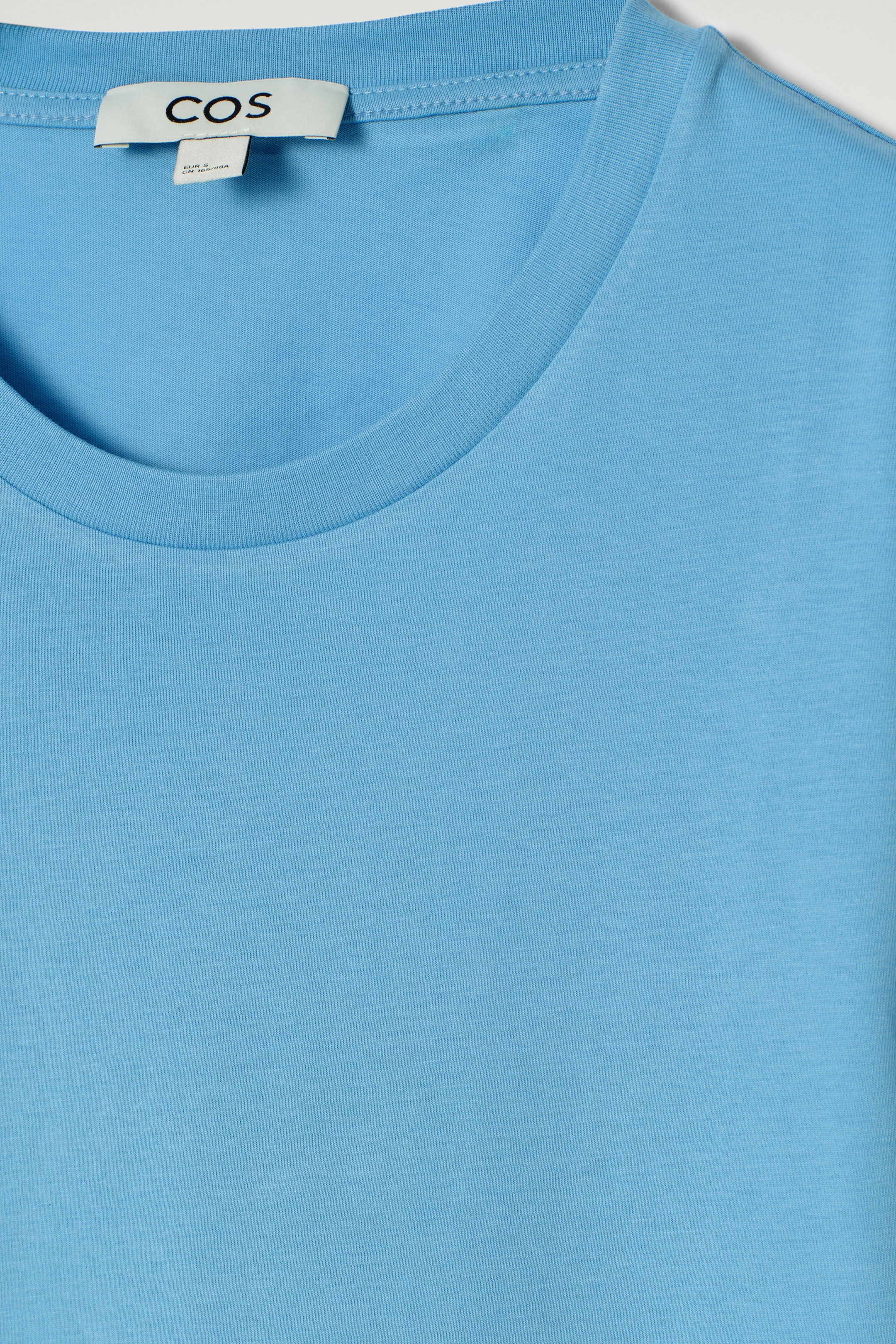 Zobacz większy obraz: BAWEŁNIANY T-SHIRT Z OKRĄGŁYM DEKOLTEM - JASNONIEBIESKI - ONA | H&M PL 5