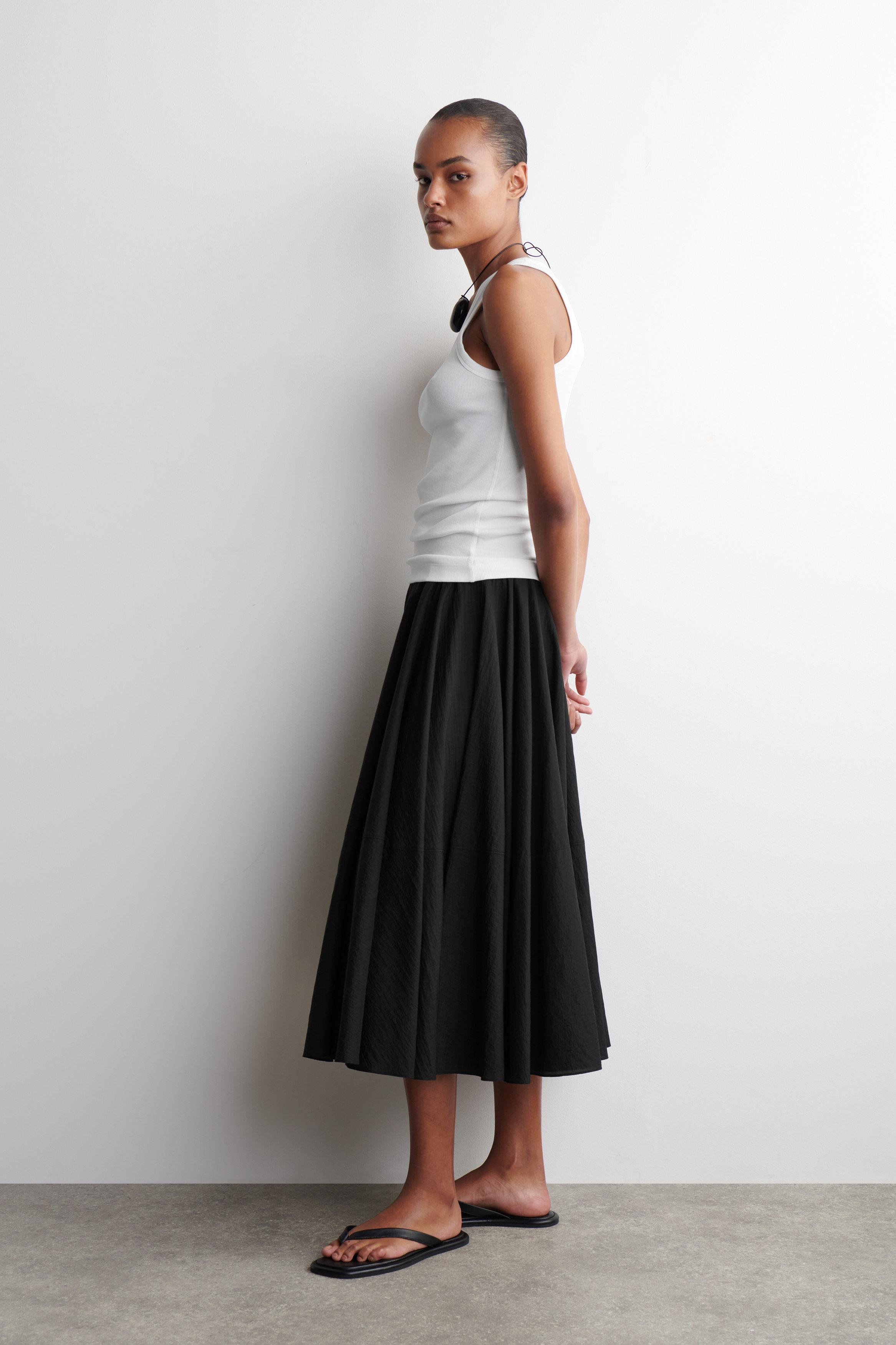 CIRCLE-CUT MIDI SKIRT - BLACK | COS