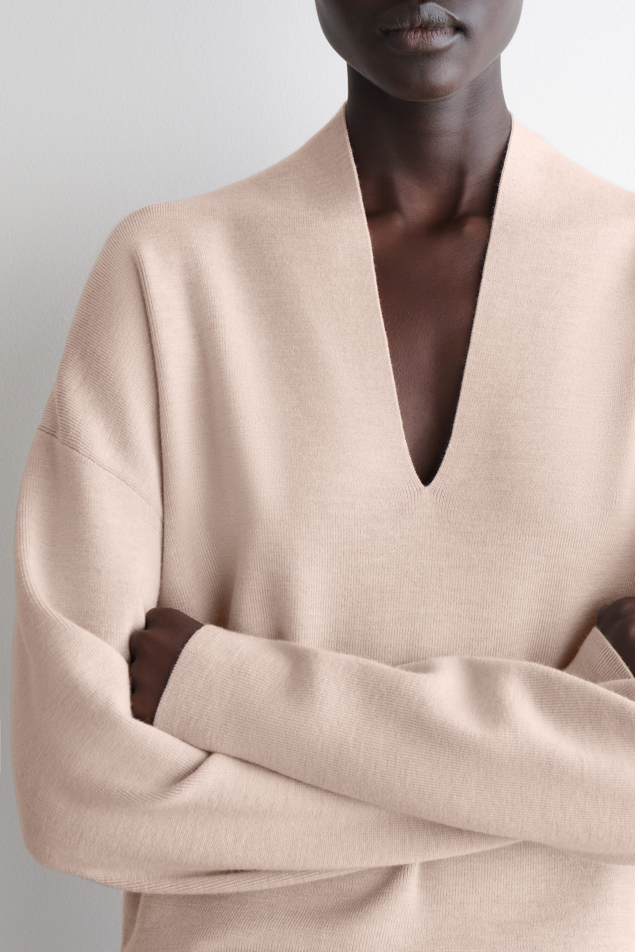 DRAPED MERINO WOOL V-NECK SWEATER