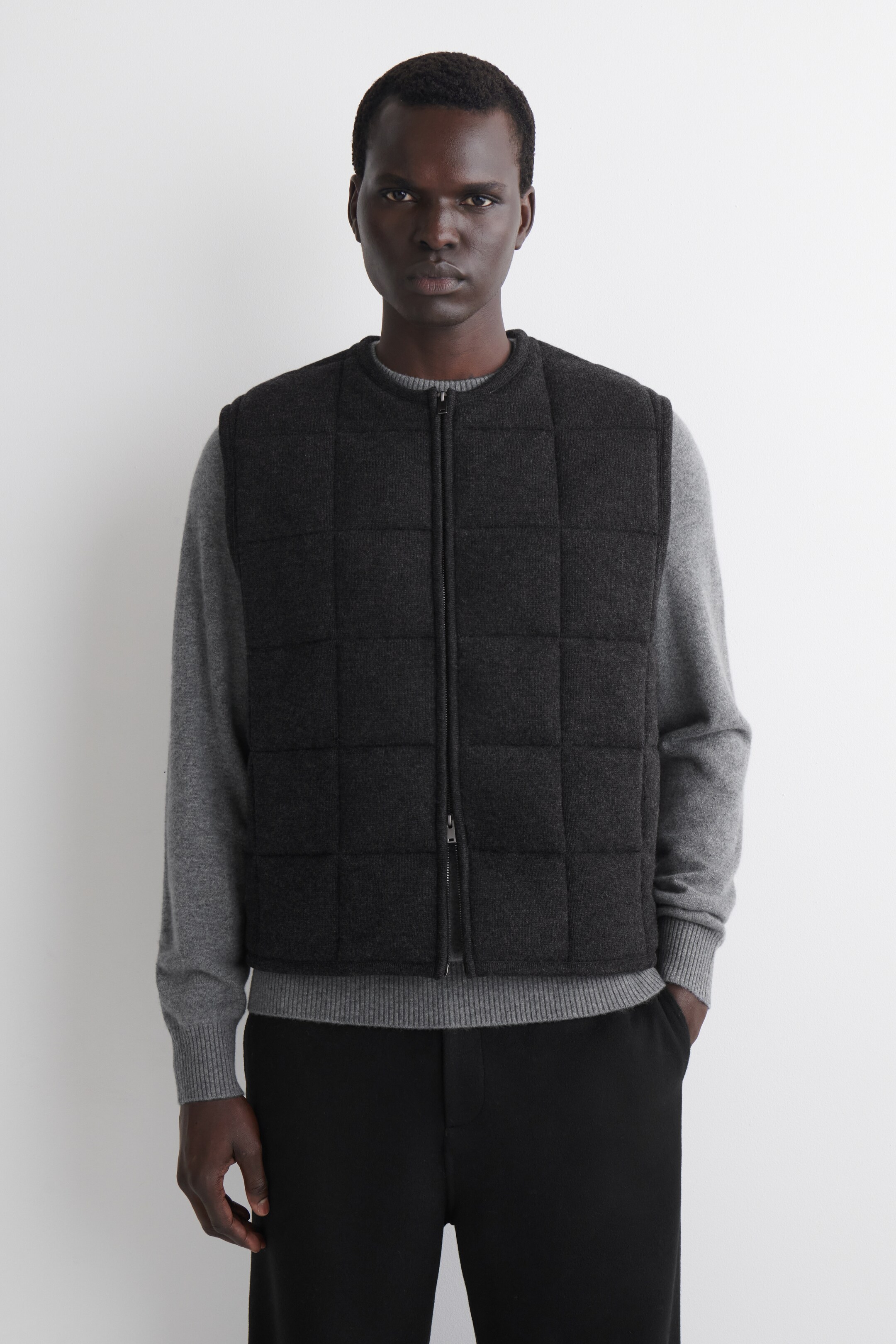 View larger image: PADDED QUILTED KNITTED MERINO WOOL GILET - CHARCOAL MÉLANGE - Men | H&M GB 1