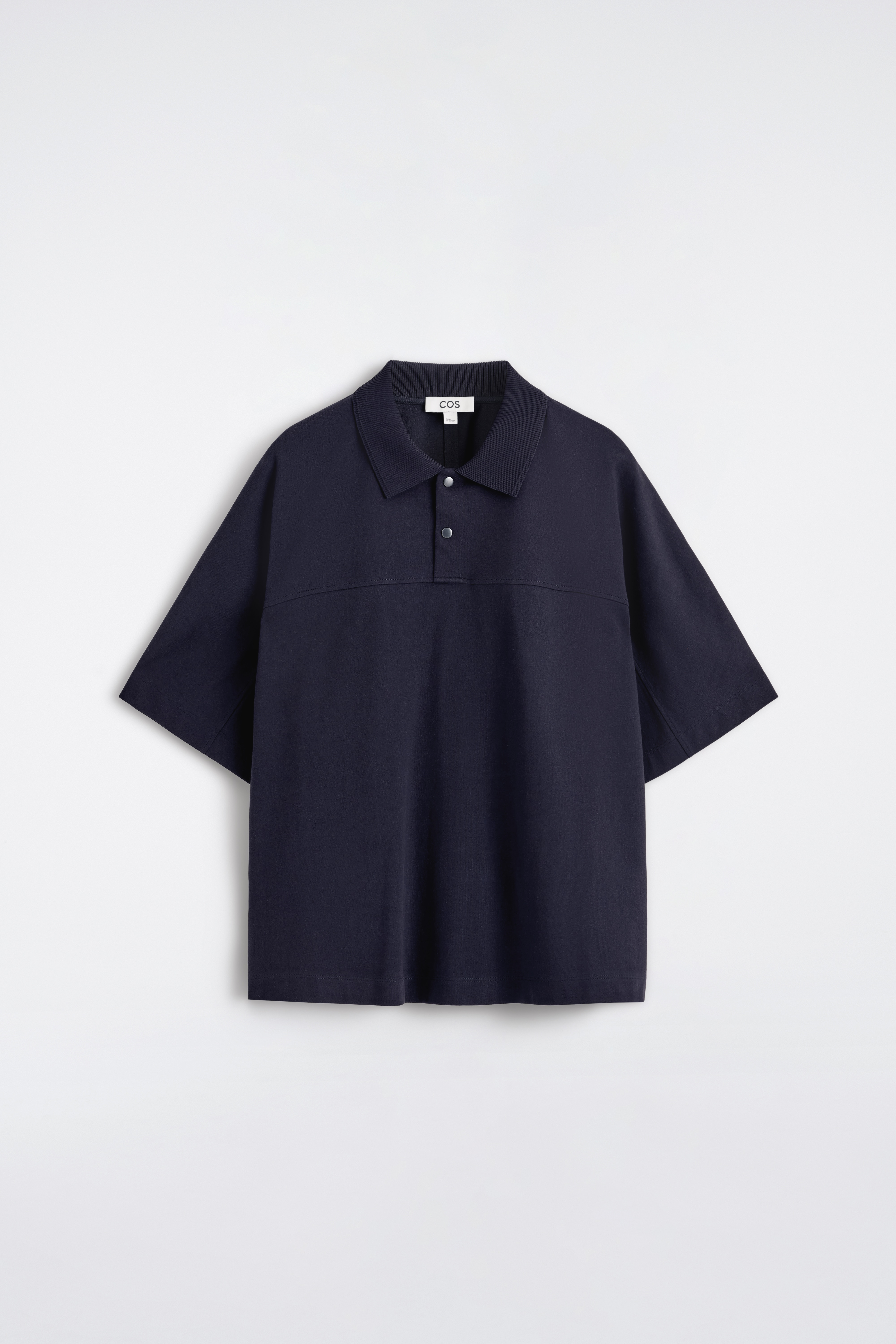 POLOSHIRT I BOMULD MED TRYKKNAPPER - MARINEBLÅ