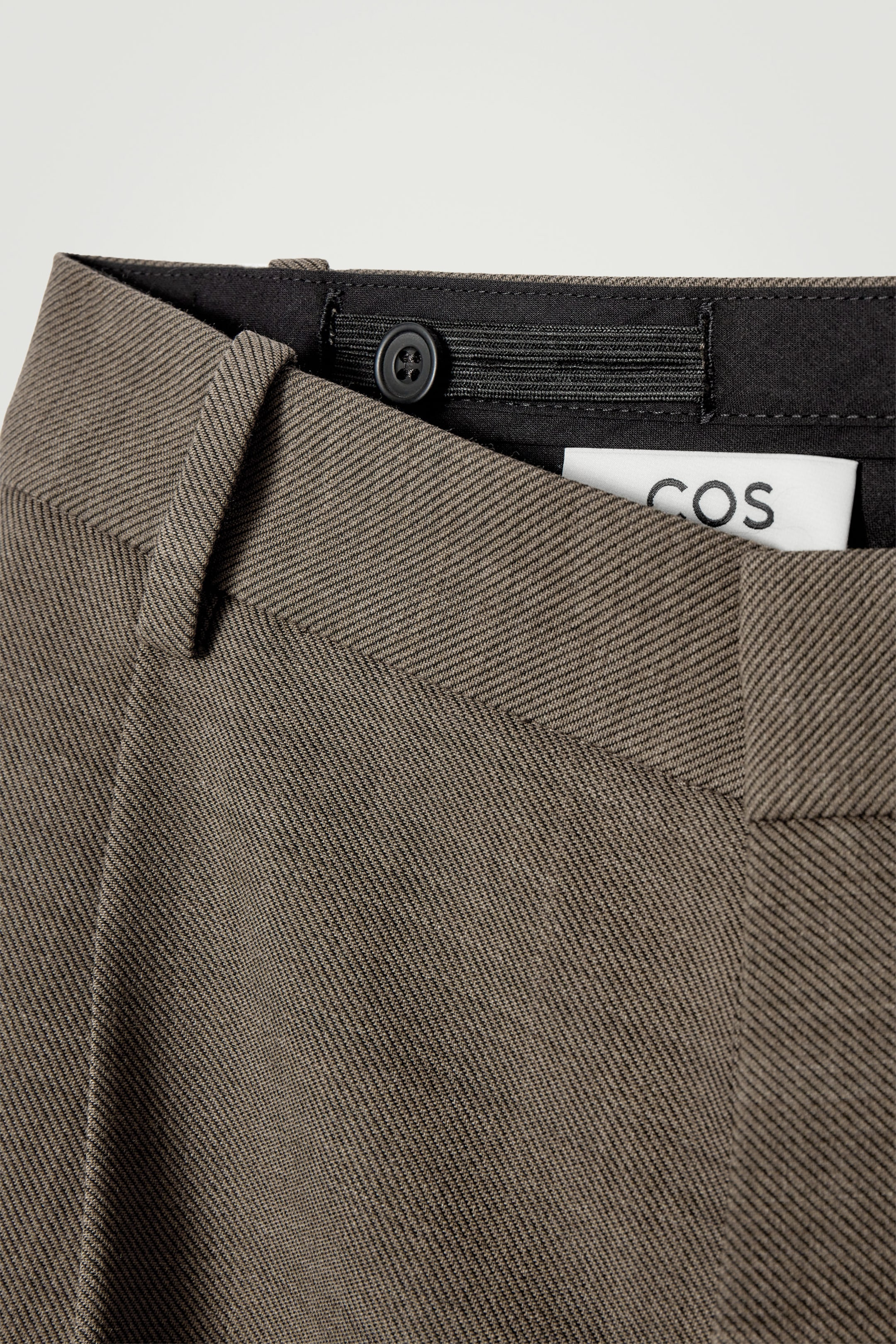 RELAXED WOOL-BLEND TAPERED TROUSERS