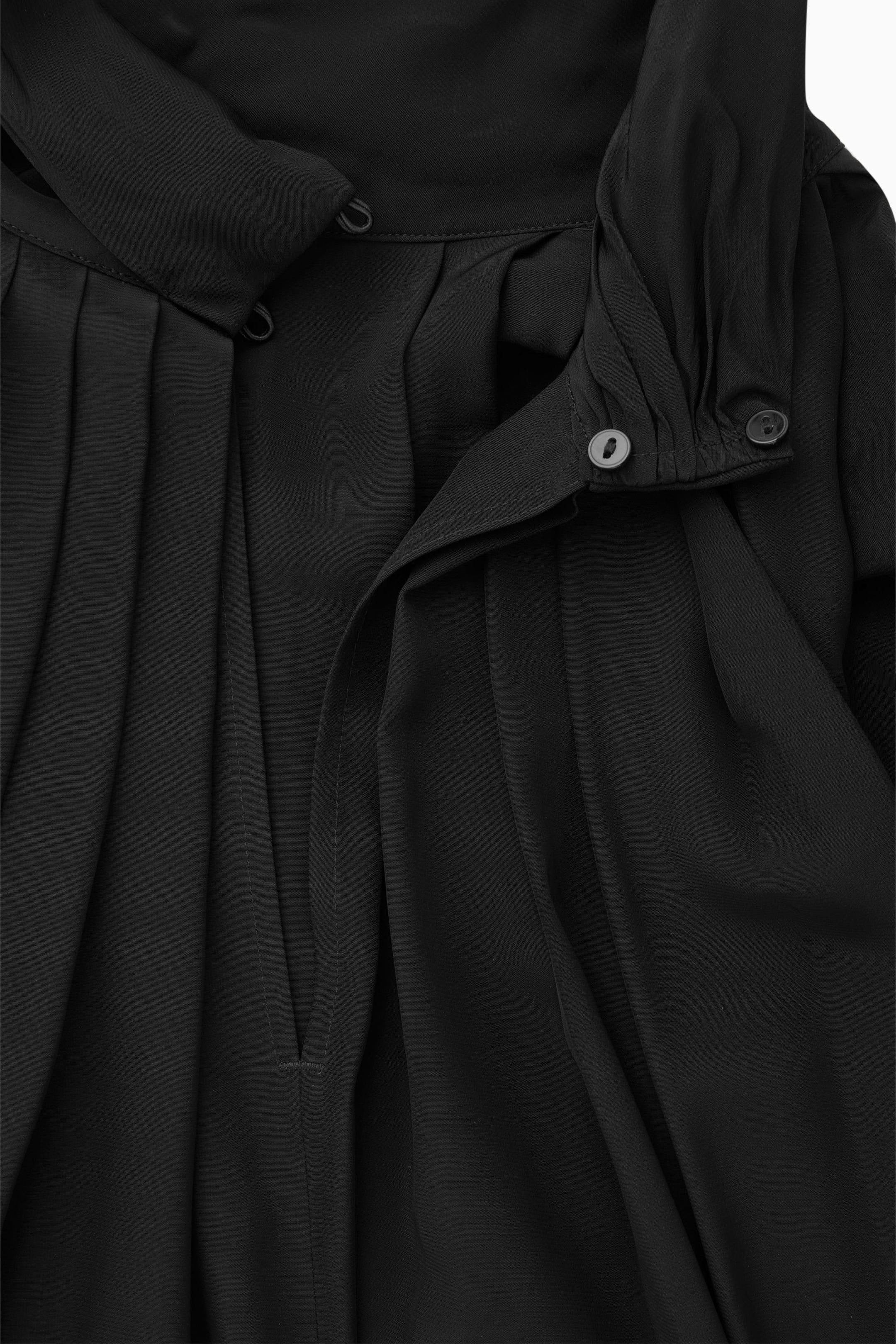 PLEATED BATWING BLOUSE