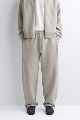 COTTON-PIQUÉ OVERSIZED BARREL-LEG JOGGERS — BEIGE 4