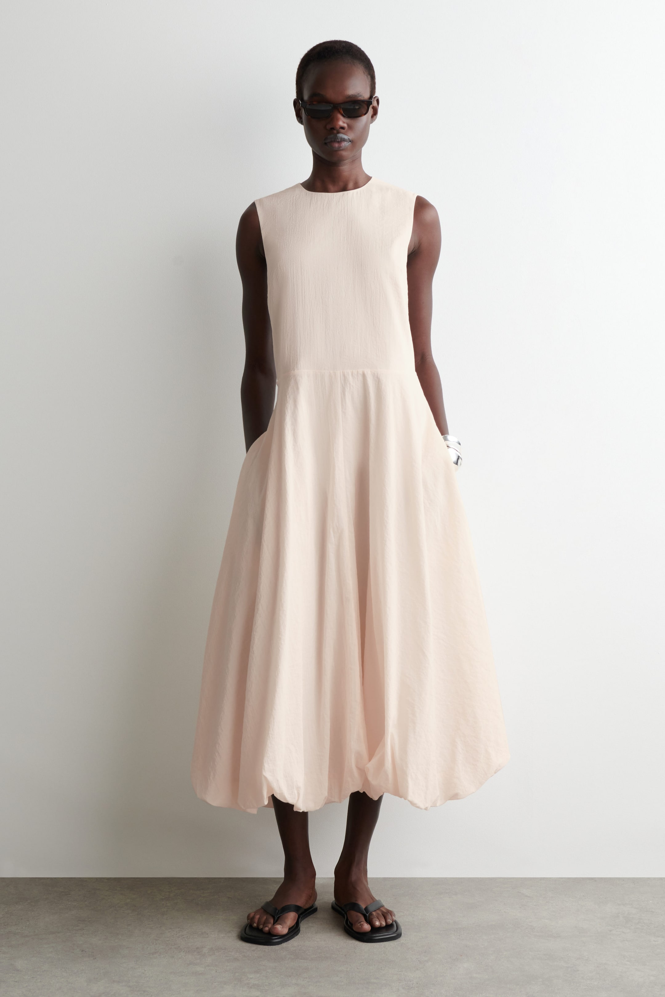 SLEEVELESS BUBBLE-HEM MIDI DRESS