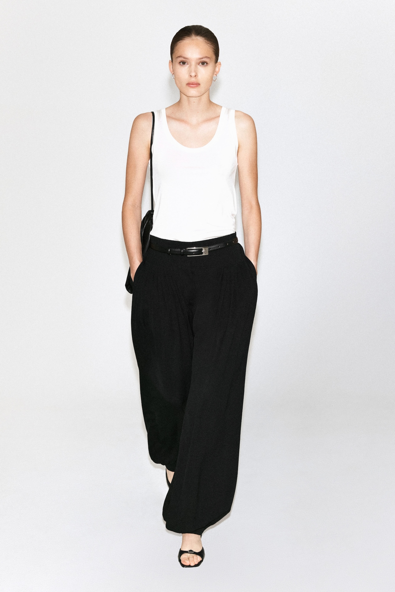 PLEATED CREPE BALLOON PANTS — BLACK