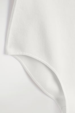 STRAPLESS RIBBED SILK BODYSUIT — CHALK 1