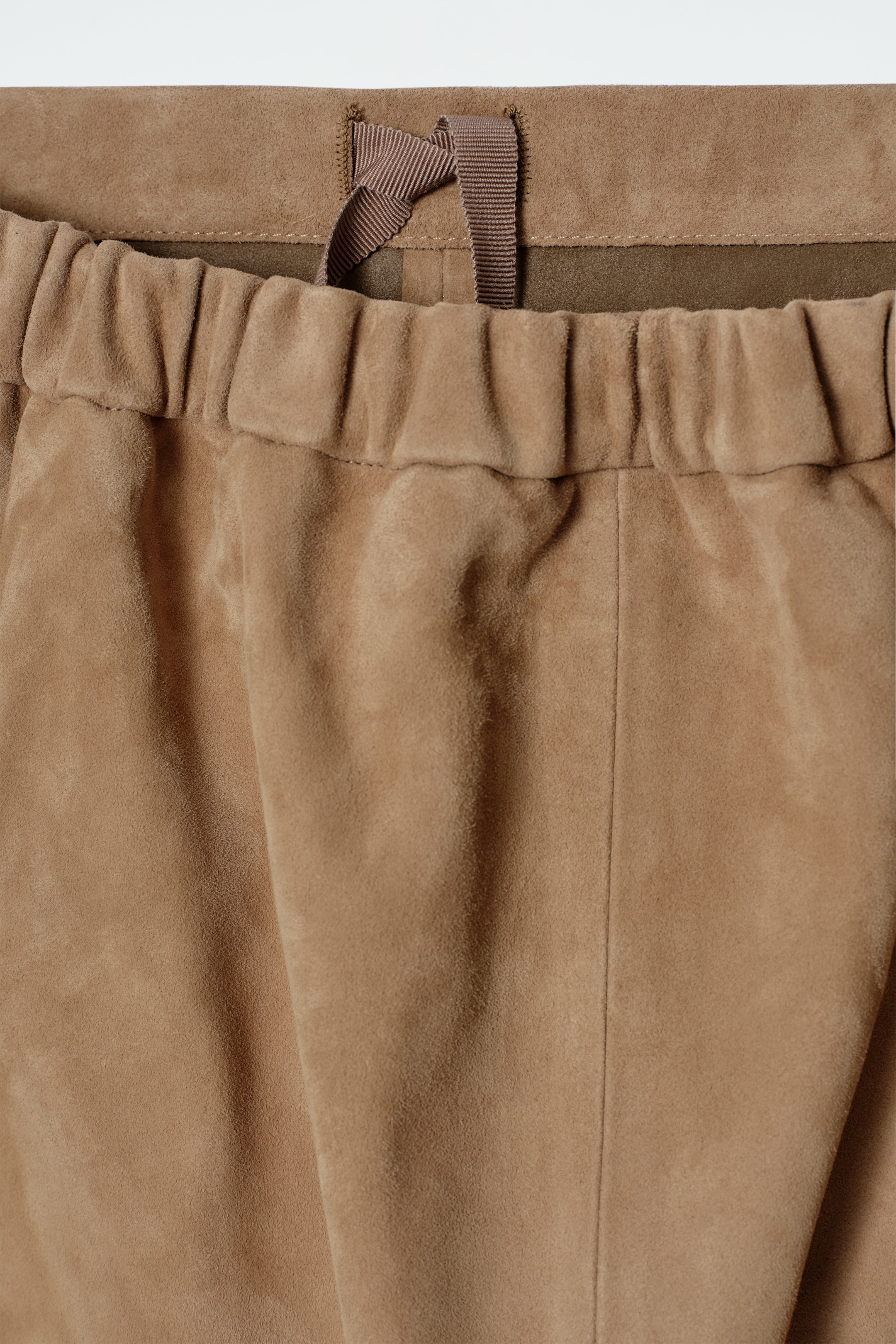 Se større billede: PANELOPDELT MIDI-NEDERDEL I RUSKIND MED SNØRE - SAND (sand) - DAME | H&M DK 6