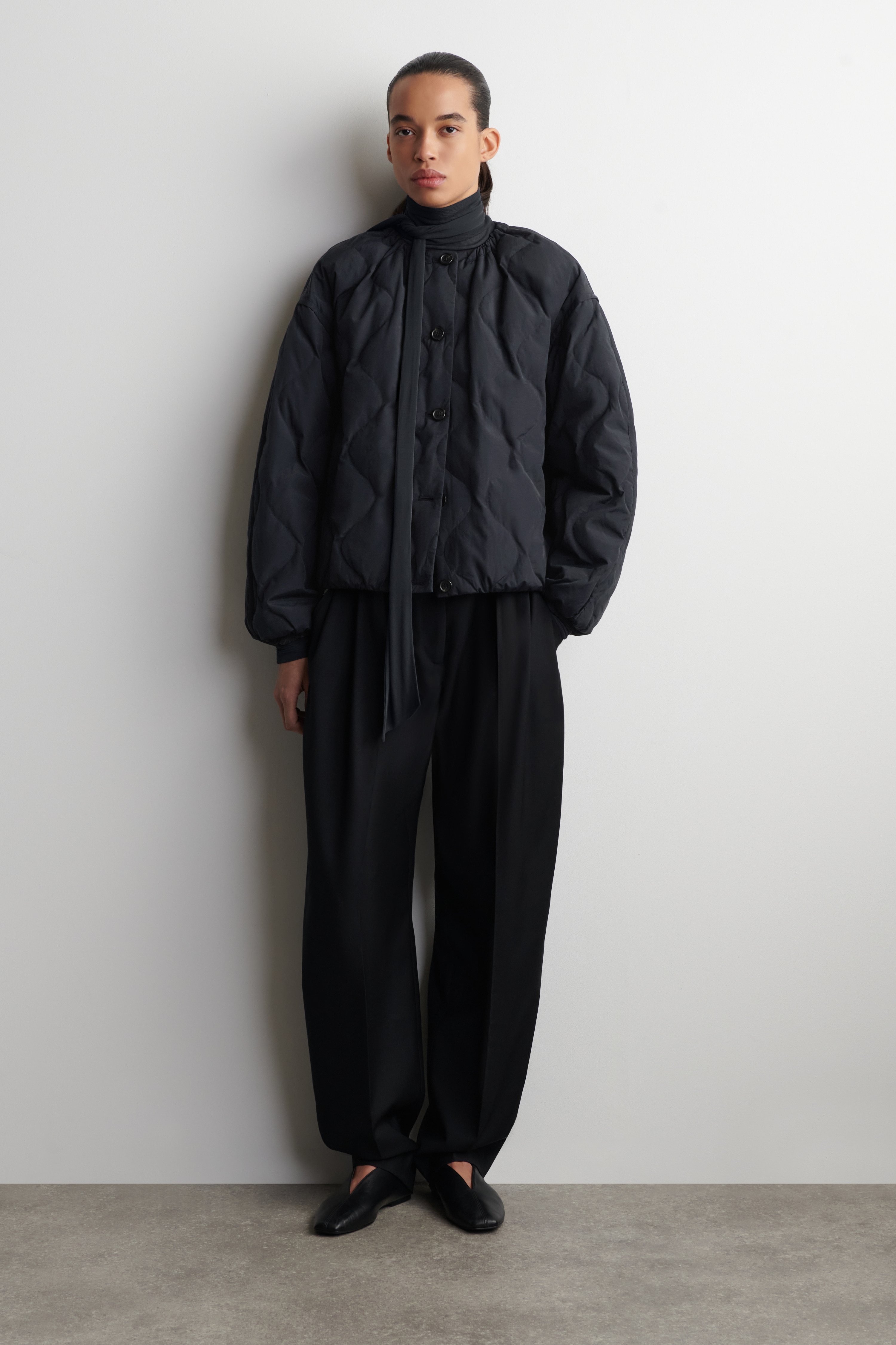 GIACCA IN PIUMINO TRAPUNTATA CON ARRICCIATURE