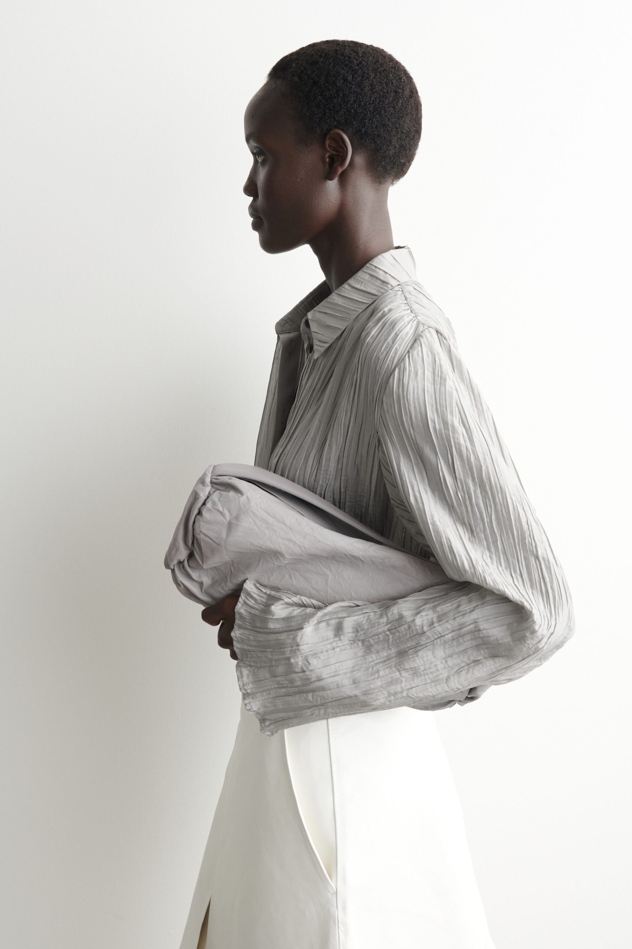 MINI CYLINDER CLUTCH BAG - TEXTURED-LEATHER — DOVE GREY