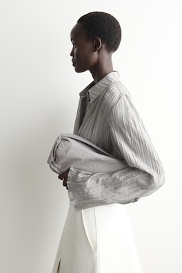 MINI CYLINDER CLUTCH BAG - TEXTURED-LEATHER — DOVE GREY 2