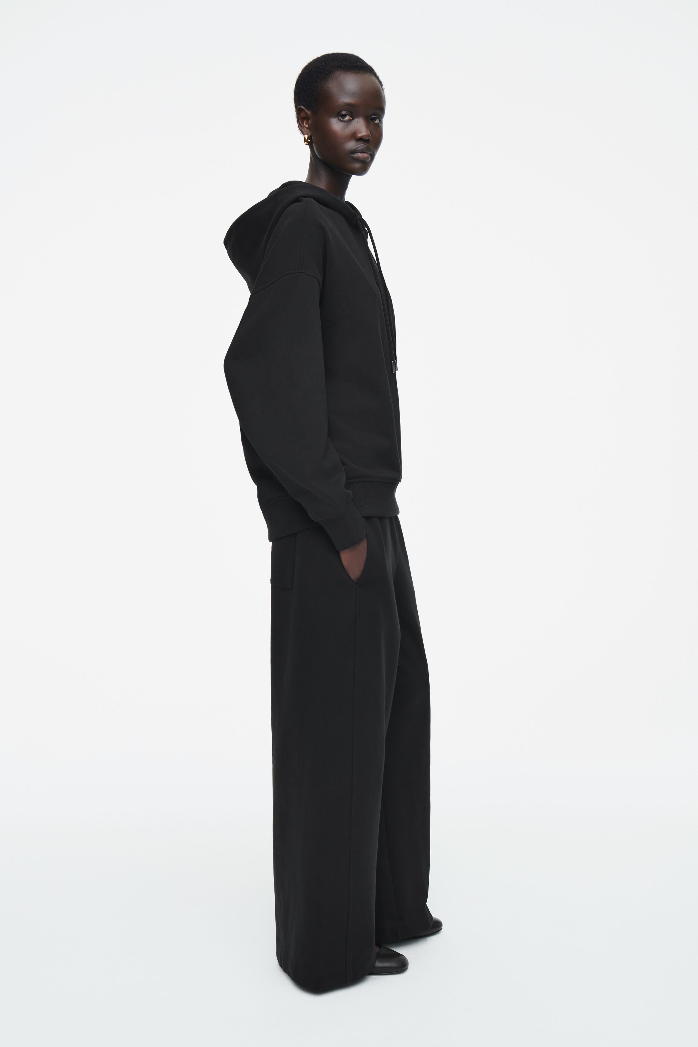 OVERSIZED JERSEY HOODIE - BLACK | COS
