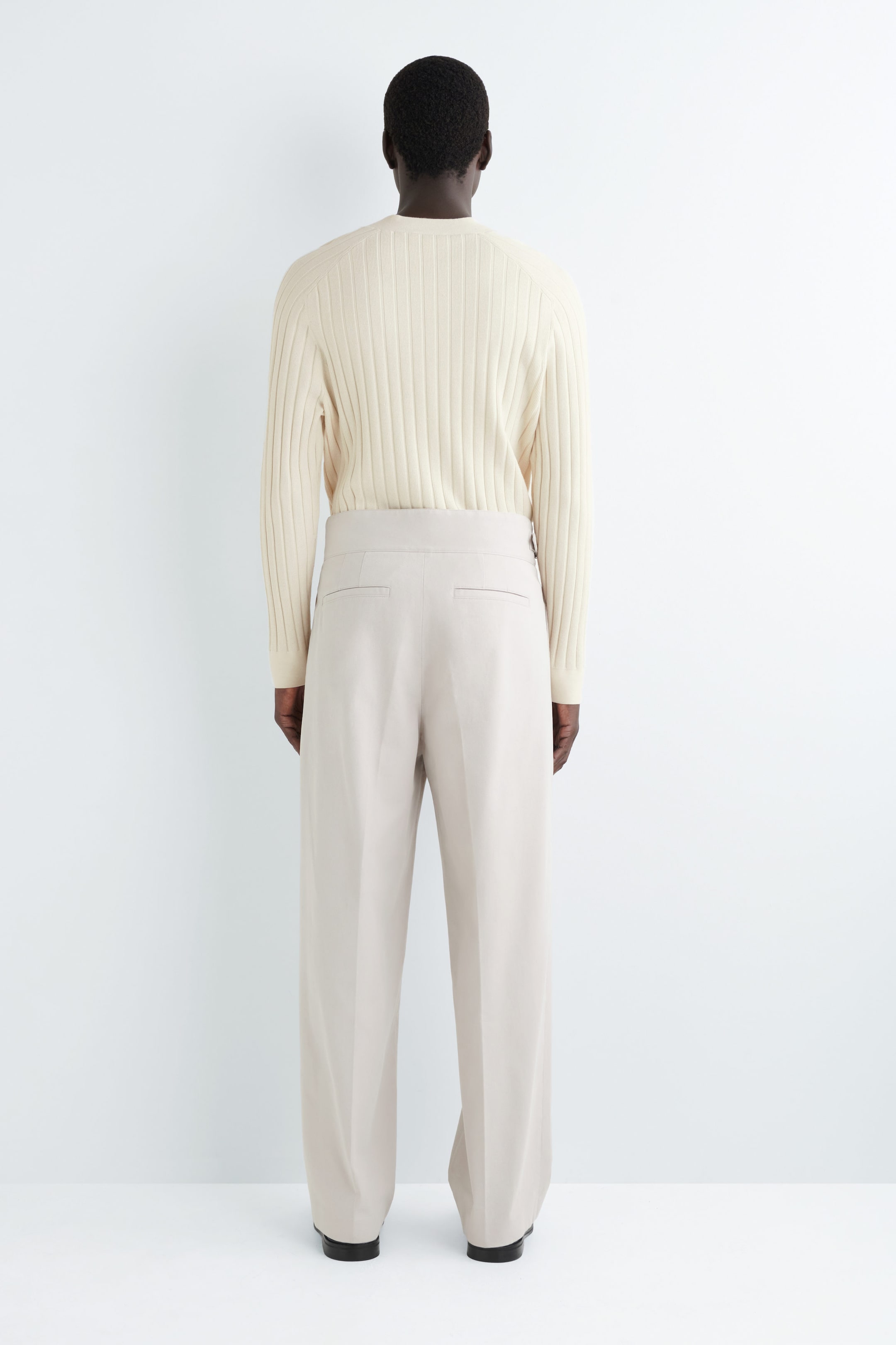 BELT-DETAIL PLEATED WIDE-LEG TROUSERS