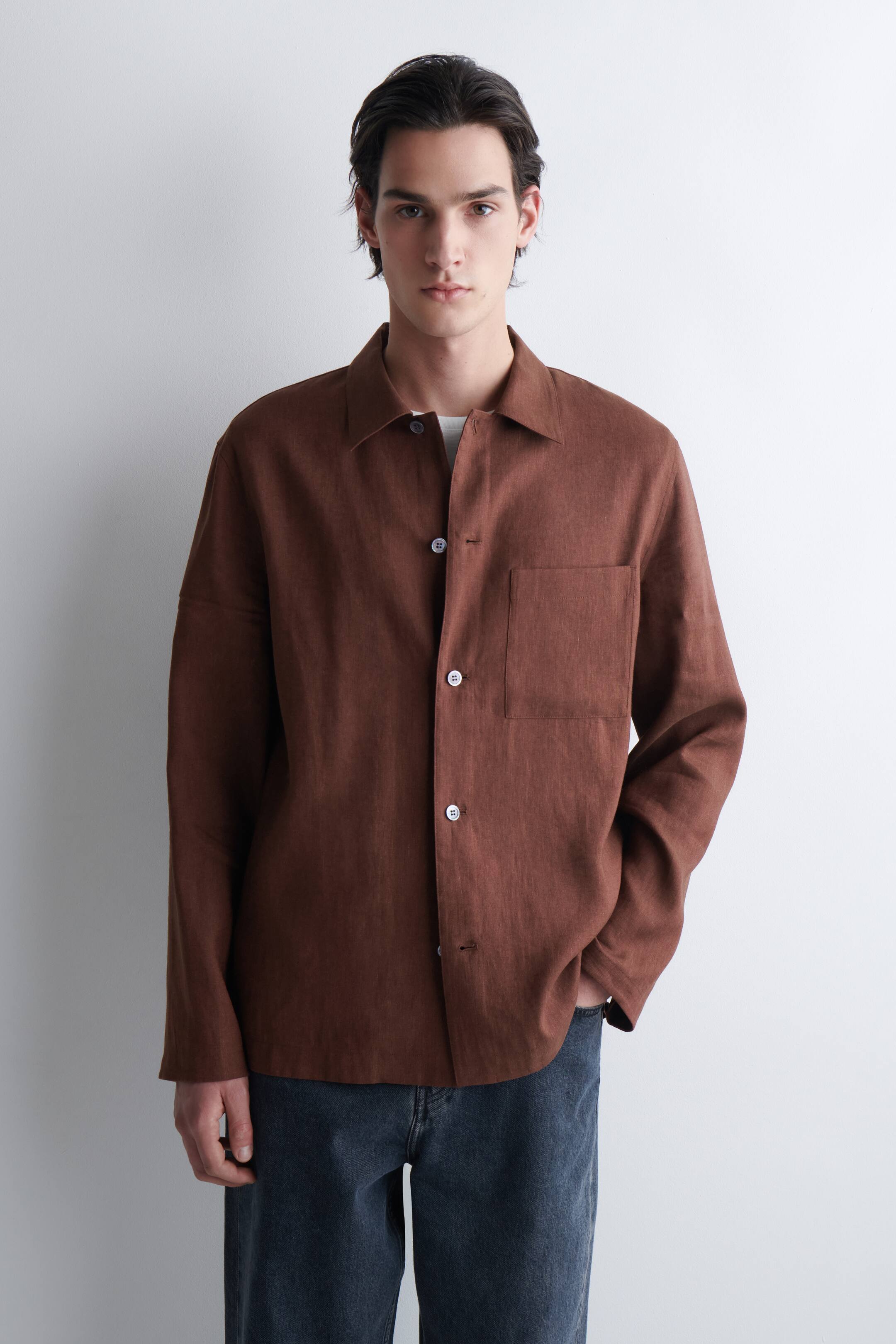 הצגת תמונה גדולה יותר: LINEN RELAXED SHIRT - RUST MÉLANGE - Men | H&M IL 1