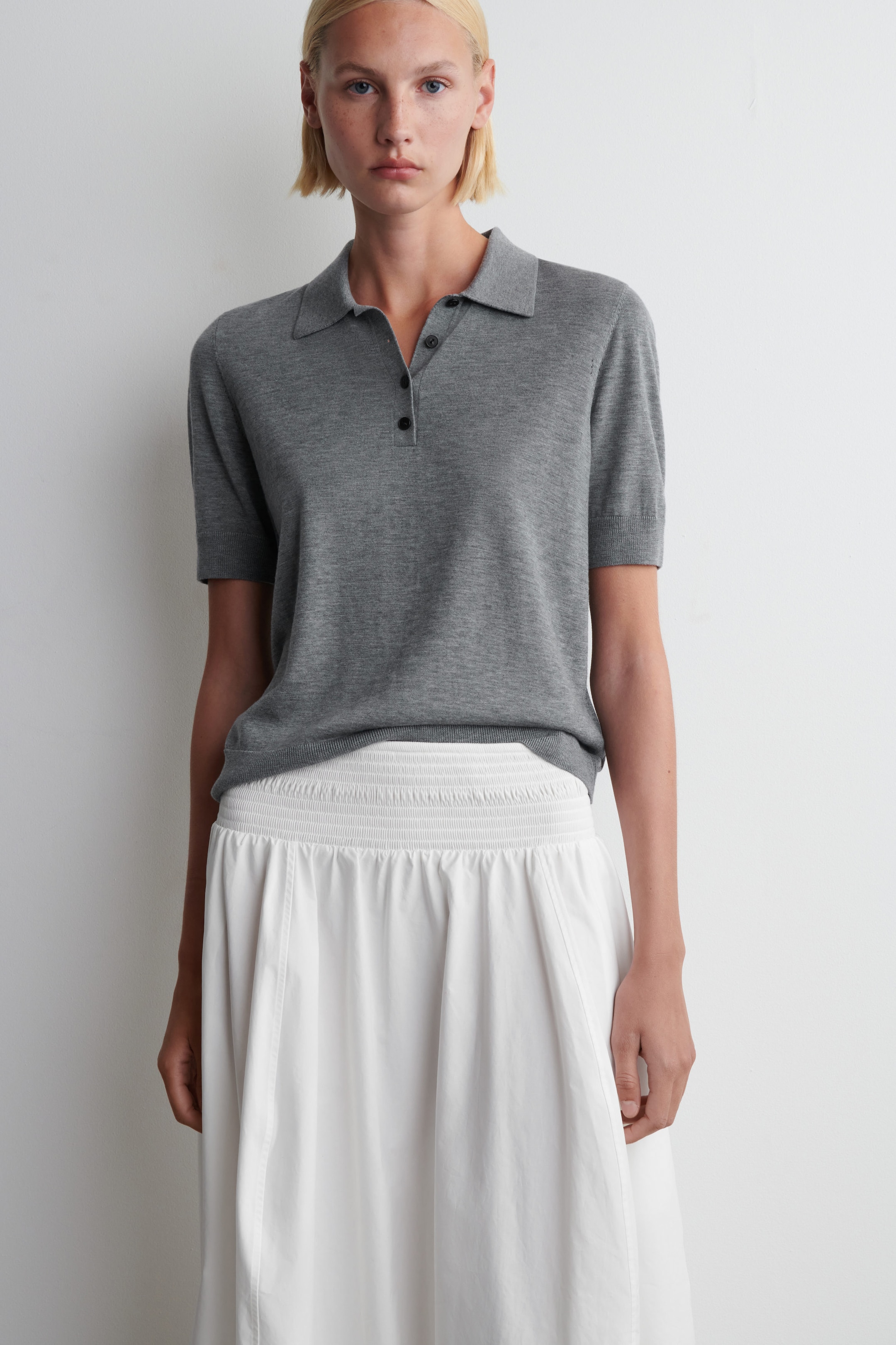 SMOCKED PANELED MIDI SKIRT