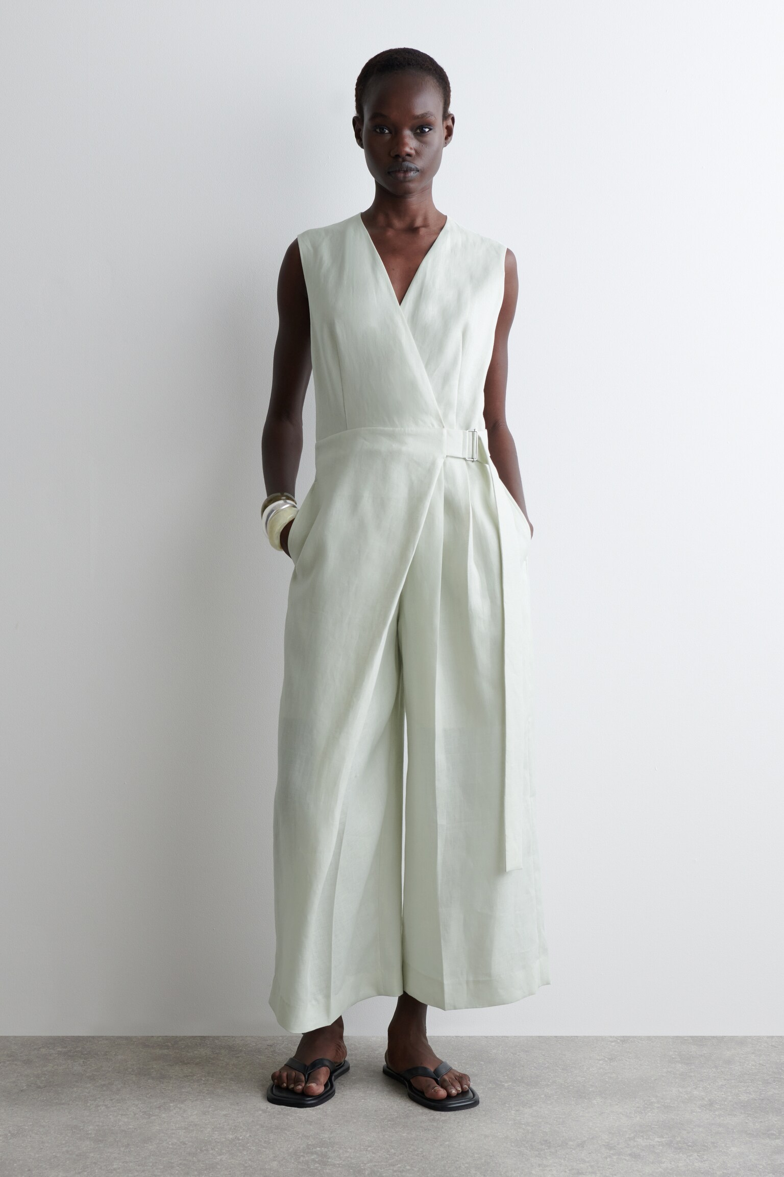 WRAP-FRONT LINEN JUMPSUIT - LIGHT GREEN/BLACK