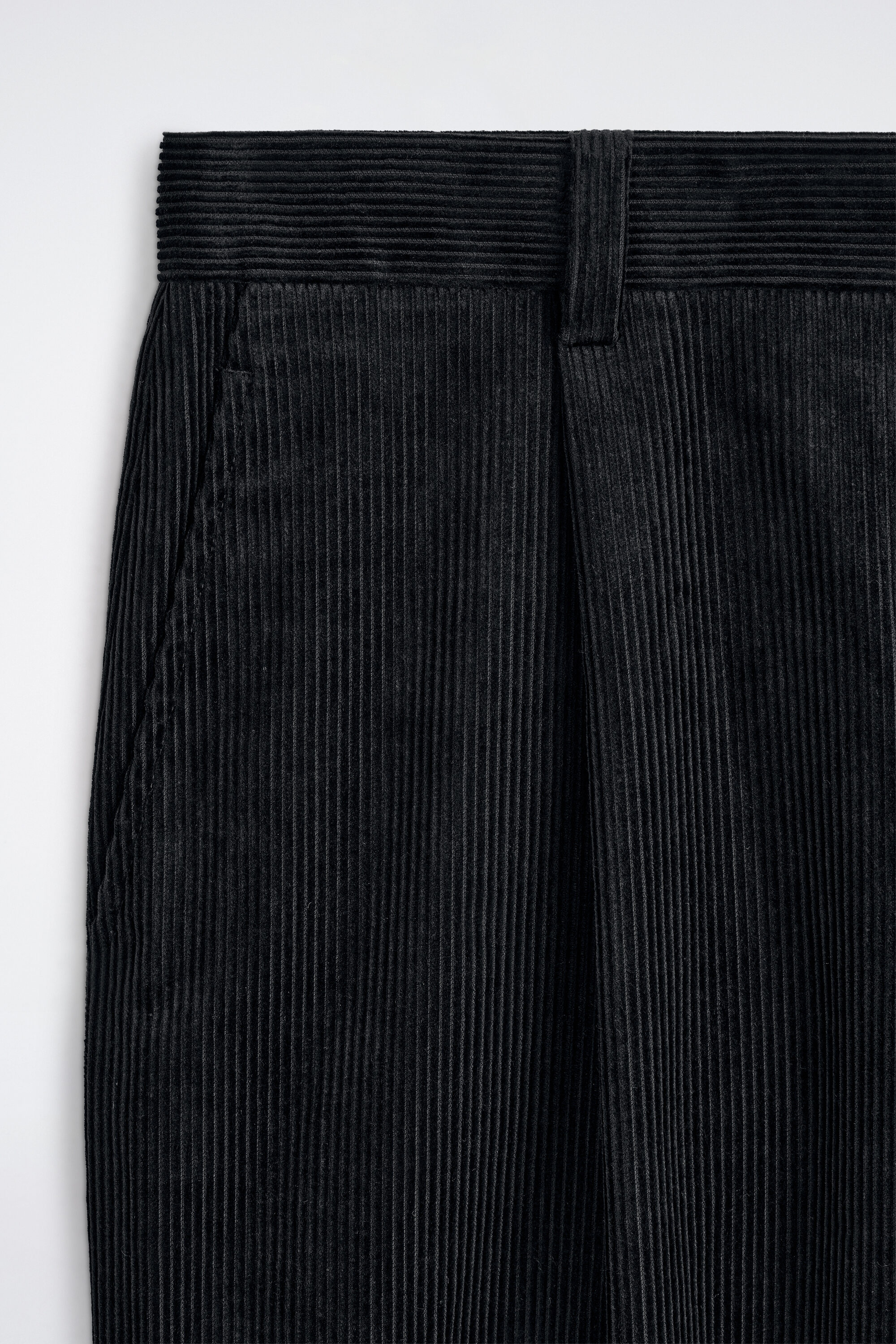 PLEATED RELAXED-FIT TAPERED CORDUROY PANTS - BLACK | COS US
