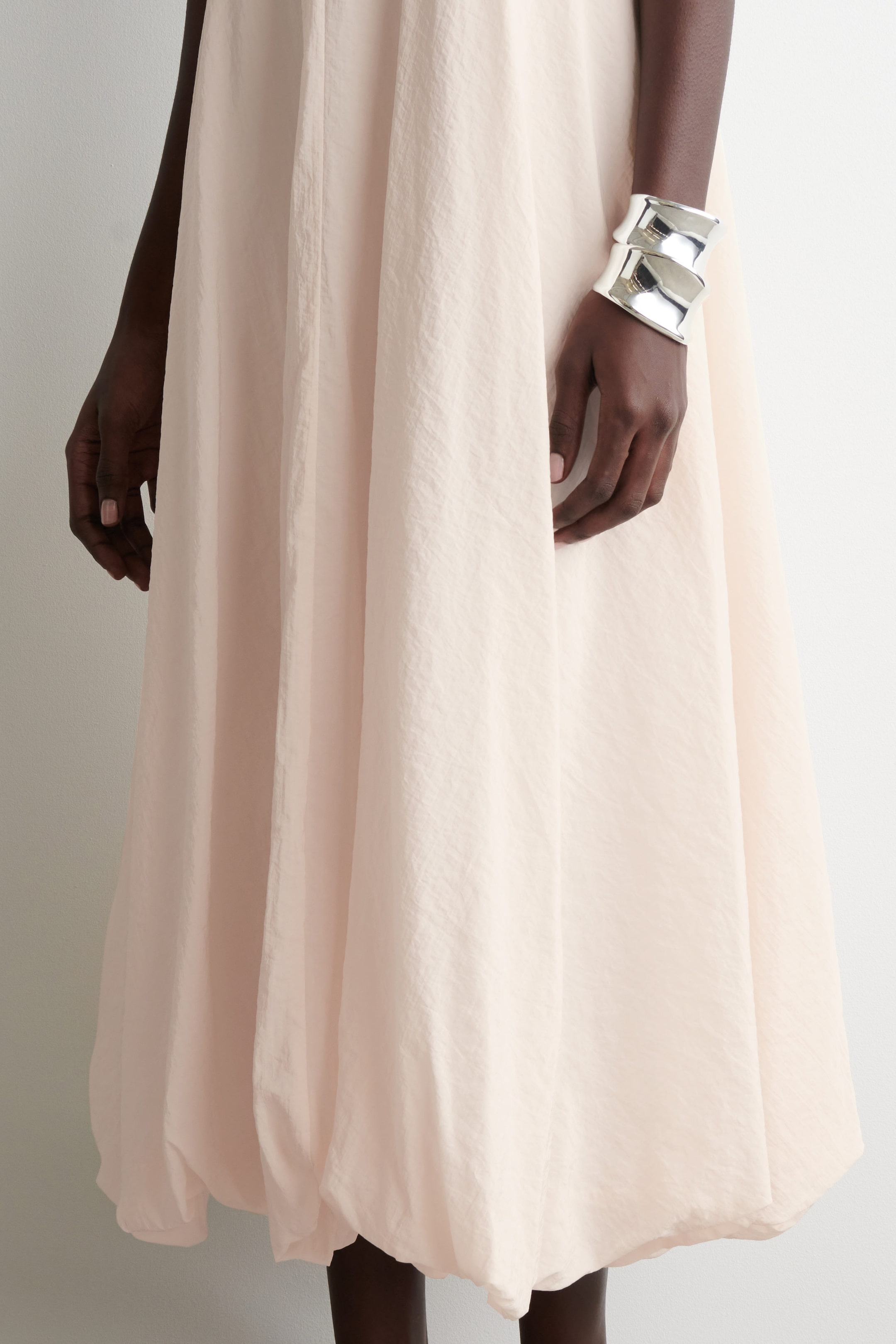 SLEEVELESS BUBBLE-HEM MIDI DRESS
